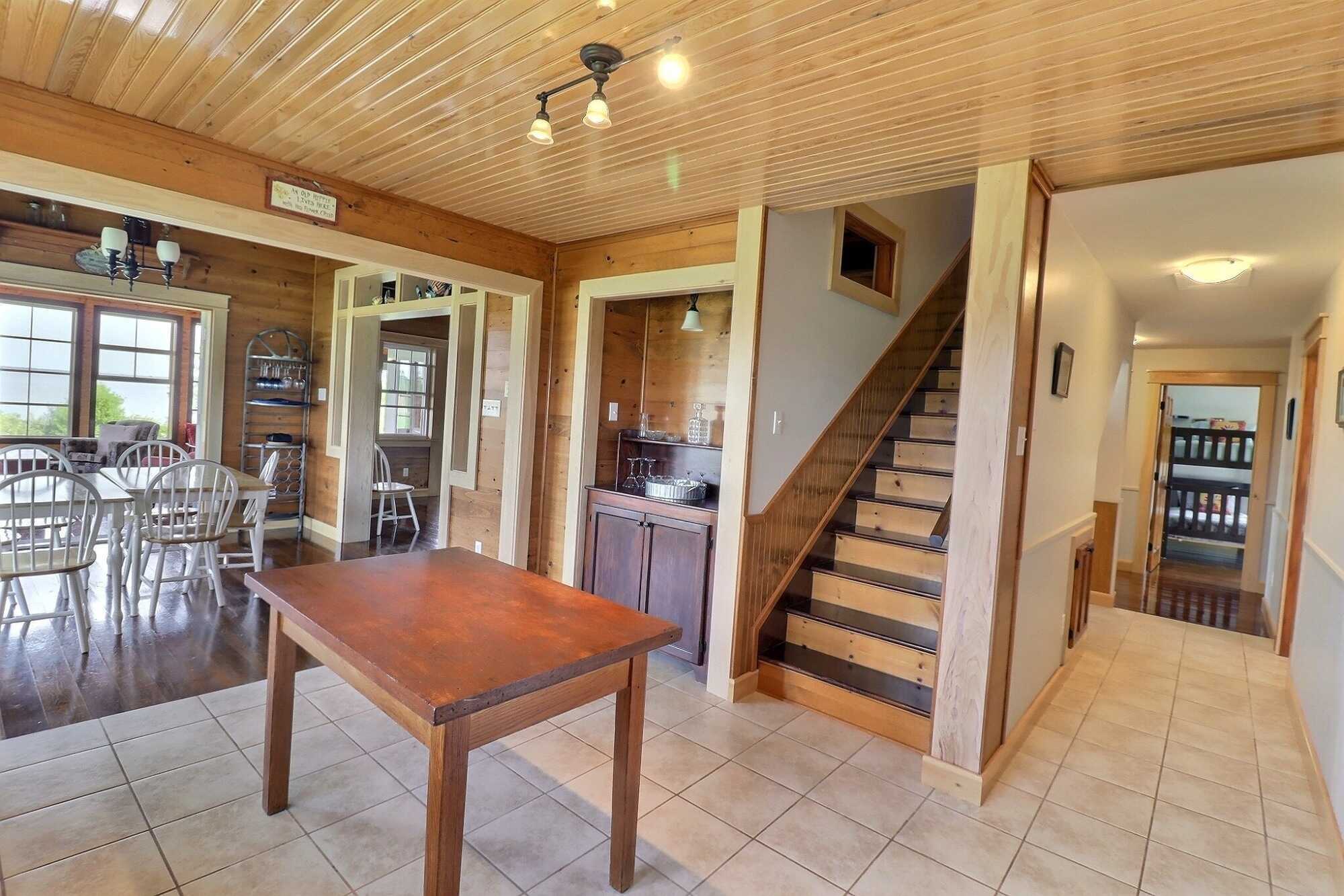65 Abby Rd. in Beach Point, PE is a picturesque waterfront retreat, perfectly capturing the charm of seaside living. 4