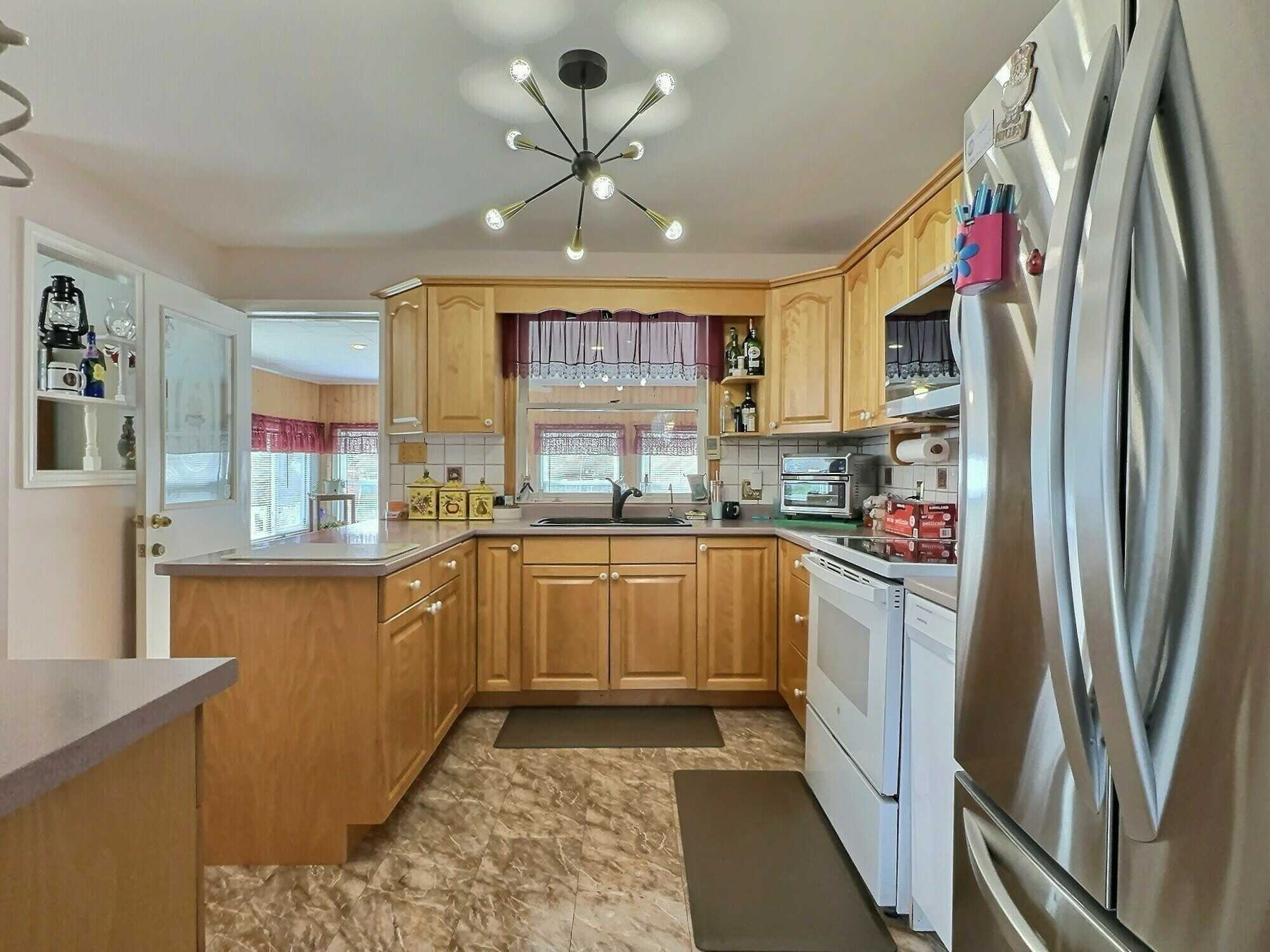 Welcome to this well-maintained 3-bedroom split entry home, ideally located in a highly sought-after Valley neighborhood! 2