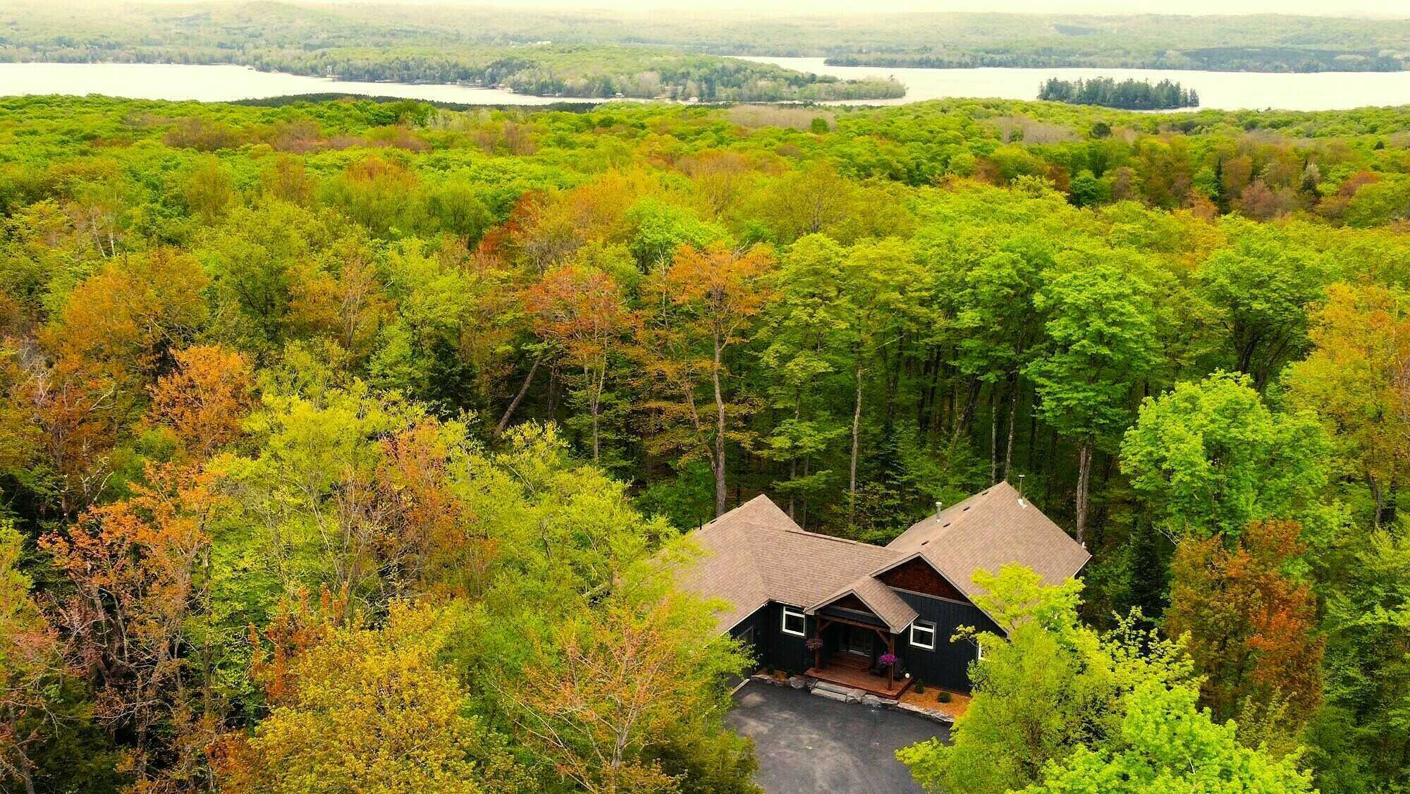 $1,339,999. Serene Woodland Heights: Updated 3-Bedroom Home on 1.25 Acres 3