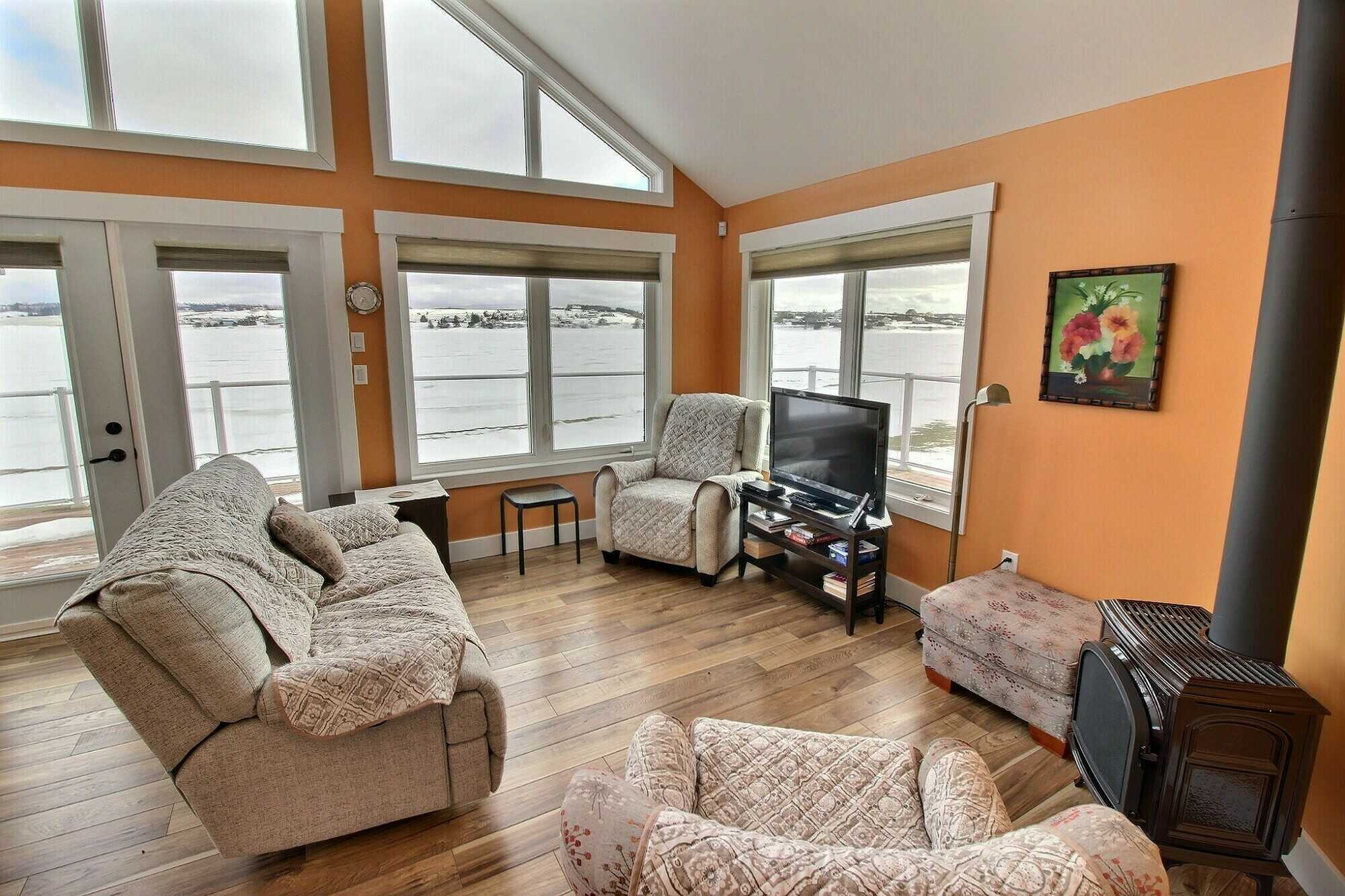 Stunning River front, year round home located on South West River , Long River. Million dollar view! 4