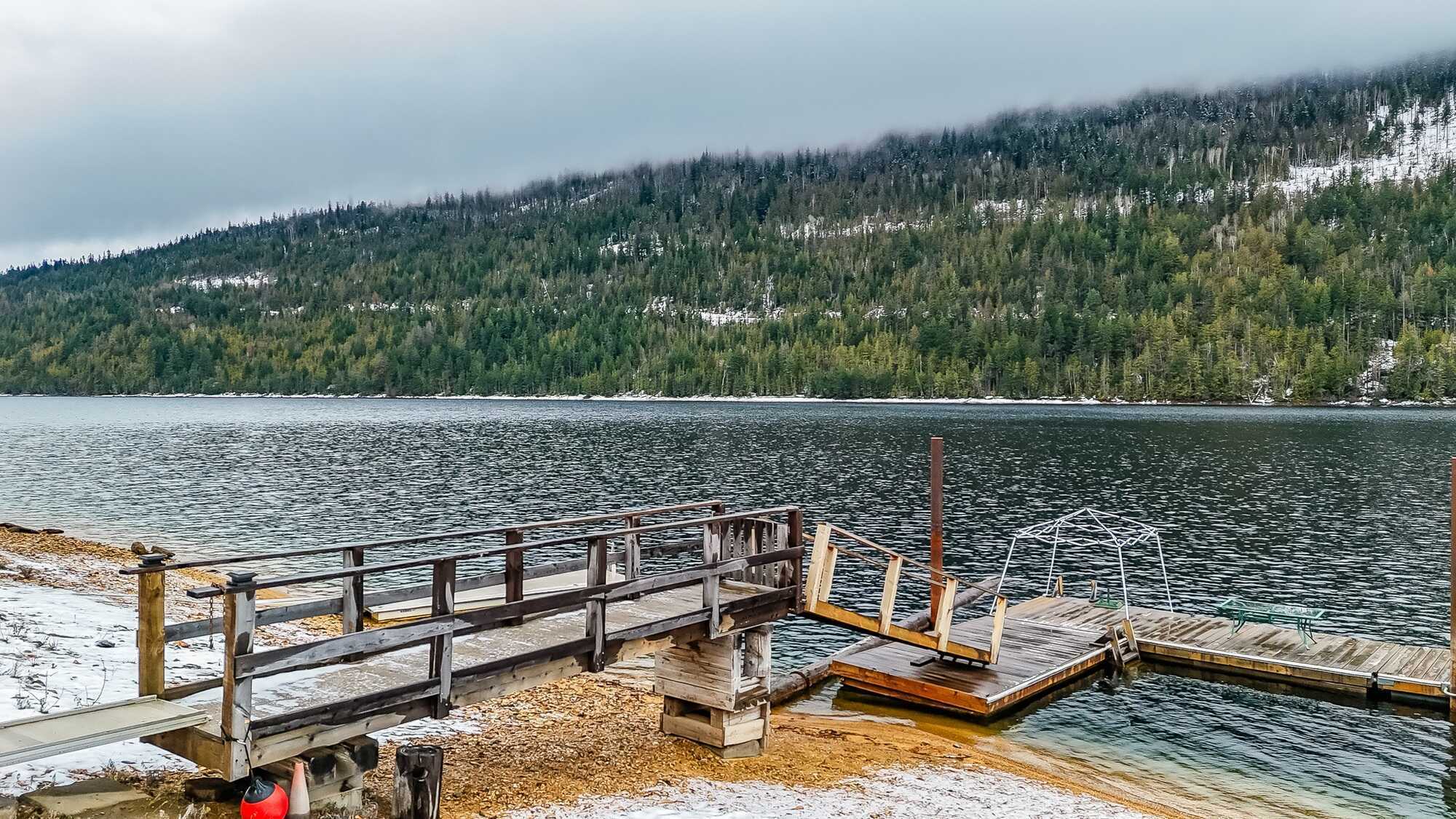 A breathtaking lakefront log cabin on Adams Lake. Custom built and thoughtfully designed, this exceptional home sits on 0.53 acres and offers 3,190 sq ft of beautifully crafted living space, blending rustic character with refined comfort. 2