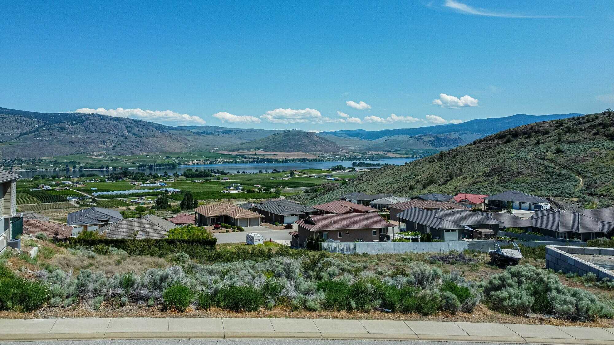 Build your dream home on this .284 acre lot overlooking the Osoyoos Golf Course with breathtaking VIEWS of the lake, mountains & downtown Osoyoos! 4