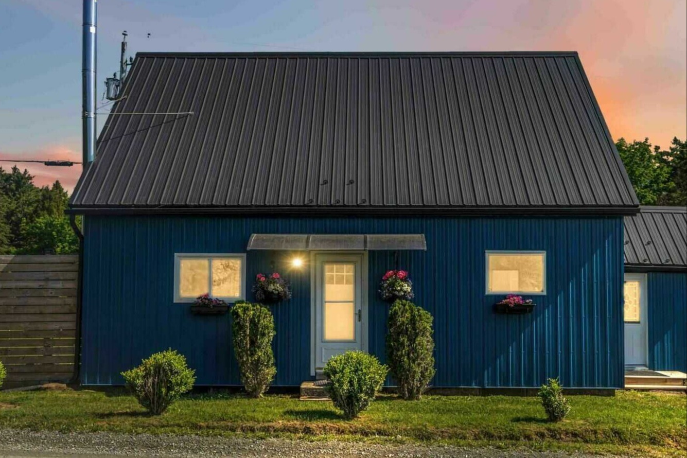 This amazing farmhouse on 2.1 peaceful acres has been completely modernized . 3