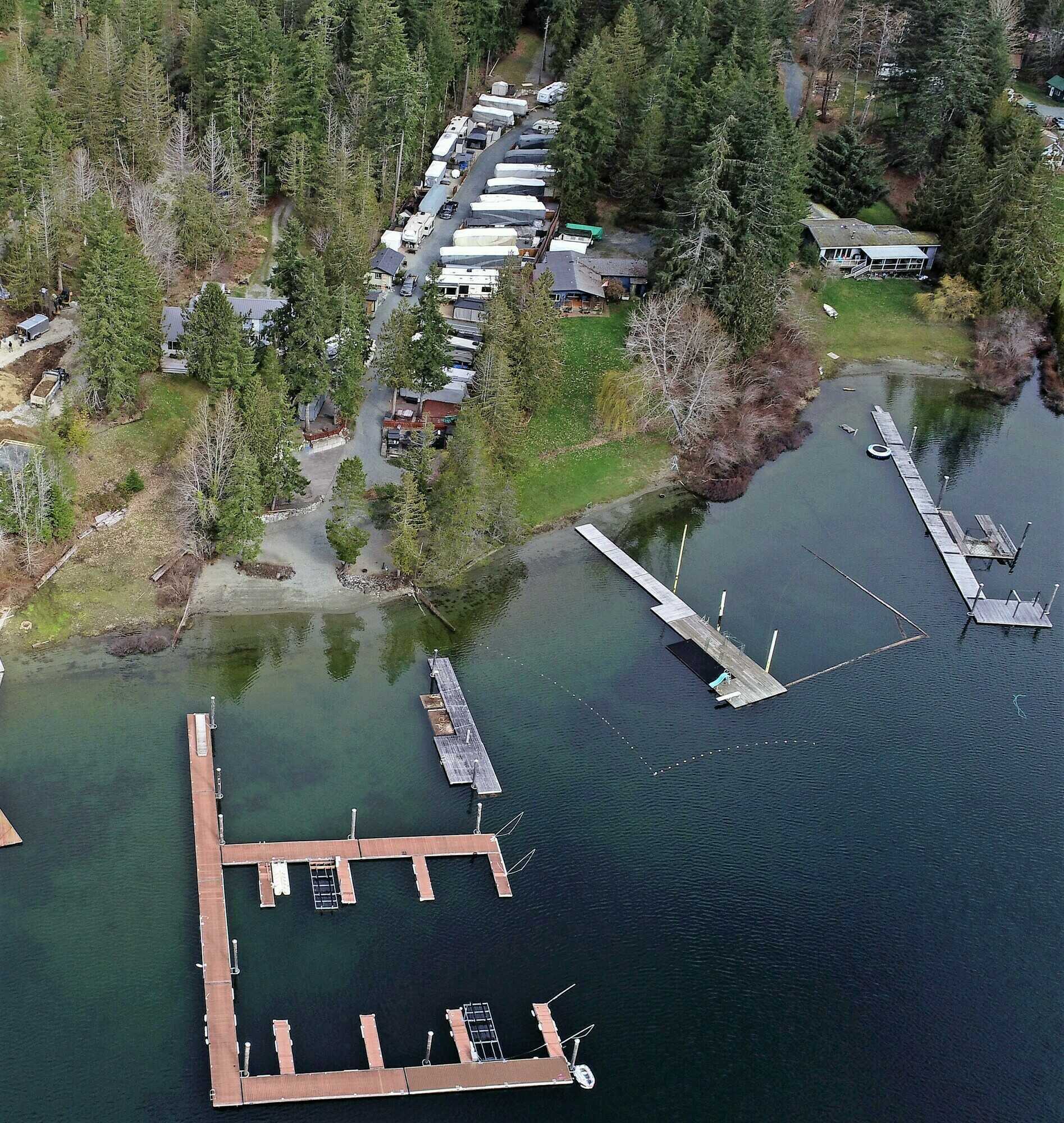 Just Listed ! NEWLY PRICED ! PRICED TO SELL ! MOTIVATED SELLER ! Realtors welcome ! Westcoast living at its very finest ! This stunning Sproat Lake RV 26x44 Strata lot on the lakefront awaits! 2
