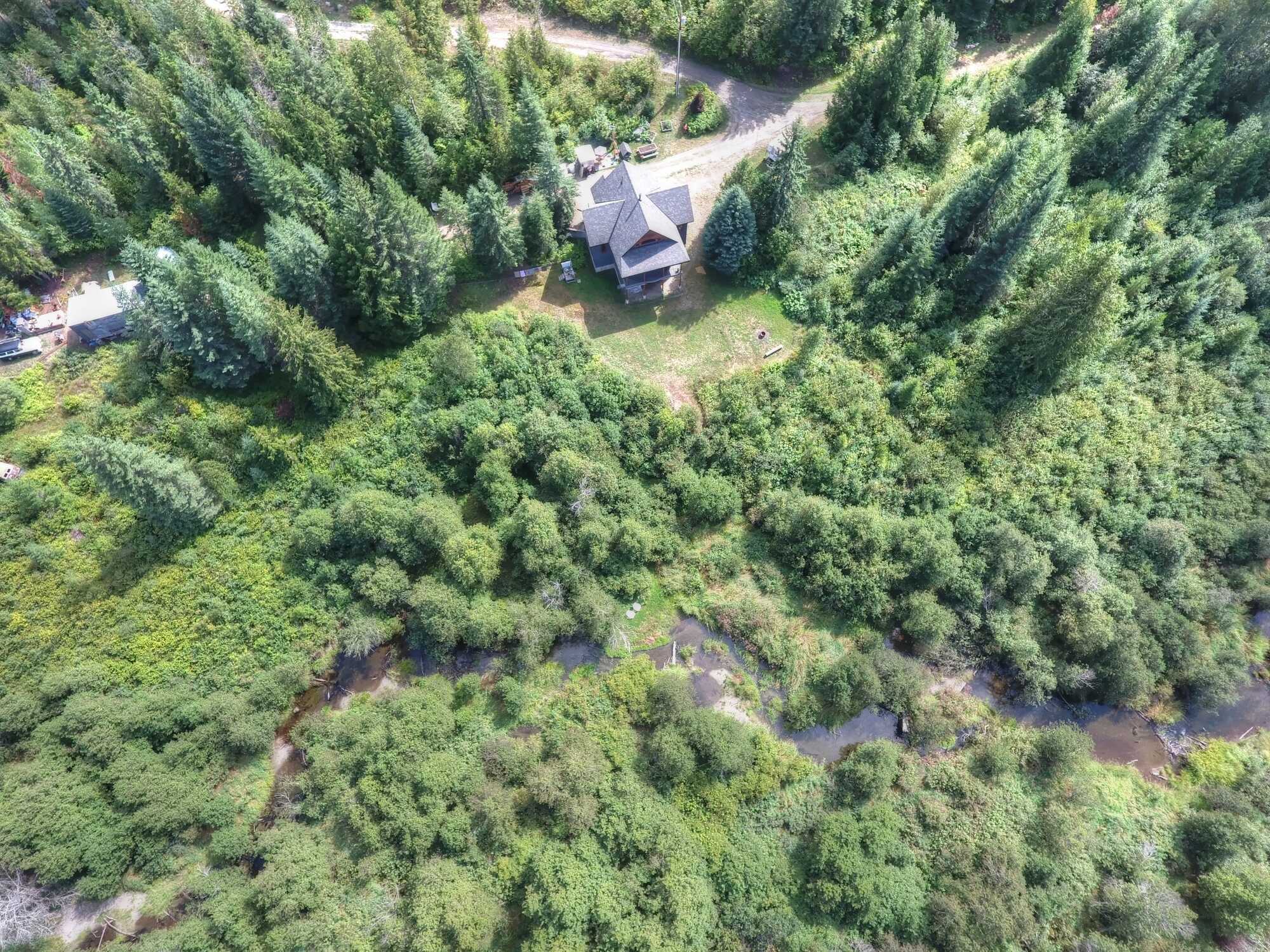 PRIVATE EXECUTIVE 4Bed 3Bath Home on 2+ Acres next to Beaver Creek, with water rights!  NEW high end appliances! NEW Septic! Amazing kitchen with commercial gas stove! Custom built windows, 23, all opening. 3