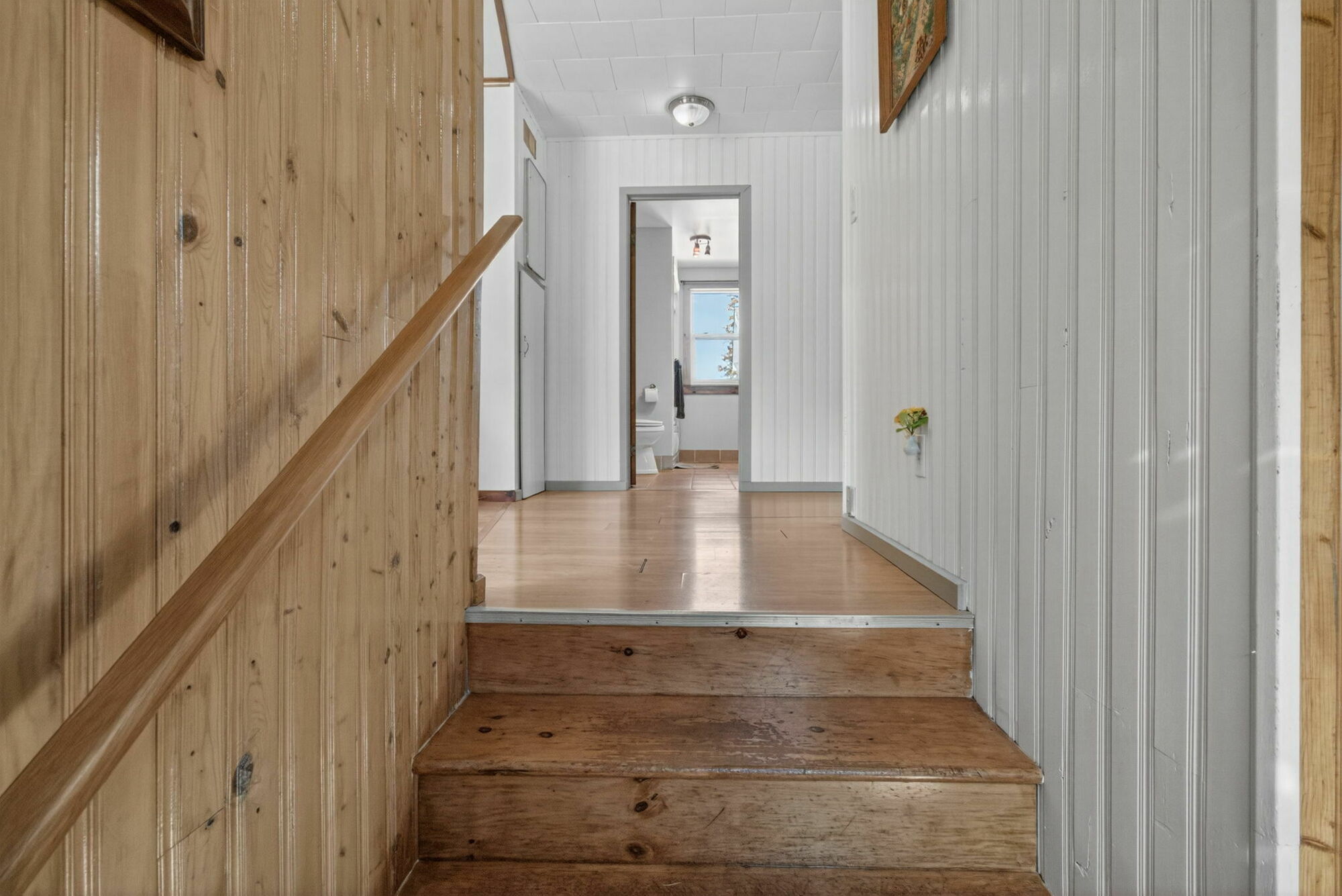 Welcome to 5591 Route 111 in Hammondvale — a spacious bungalow set on a private 1-acre lot, offering nearly 1,800 sq ft of well-laid-out living space. 2