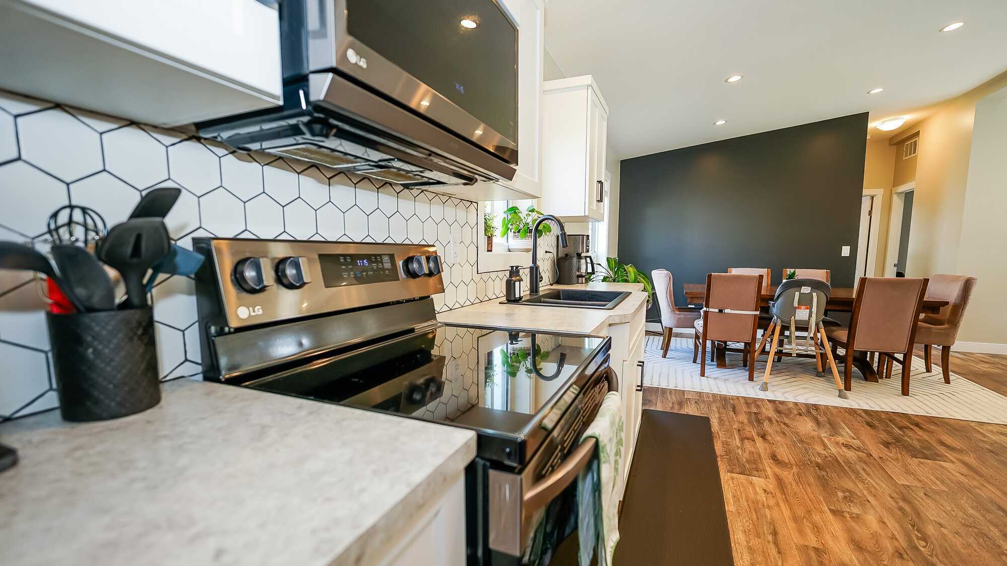 Bright, Modern 3-Bed, 2-Bath Built in 2023 at 44 Johnson Way, Revelstoke. With everything just two years old, the home is move-in ready and exceptionally well maintained. 5
