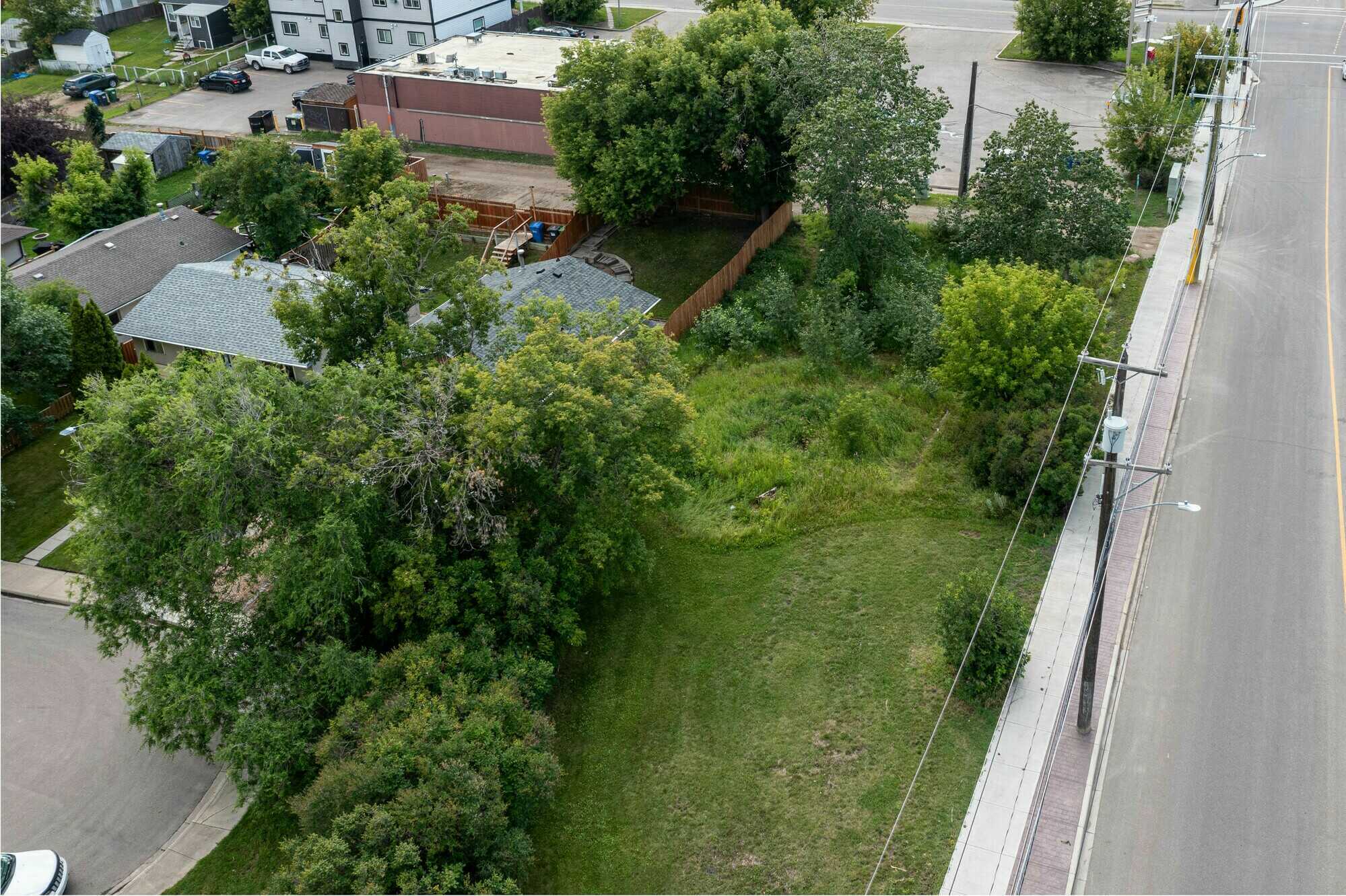 INVESTORS ALERT! Prime Redevelopment Opportunity in Riverside Meadows ~ Small-Scale Commercial Or Residential Development! 2