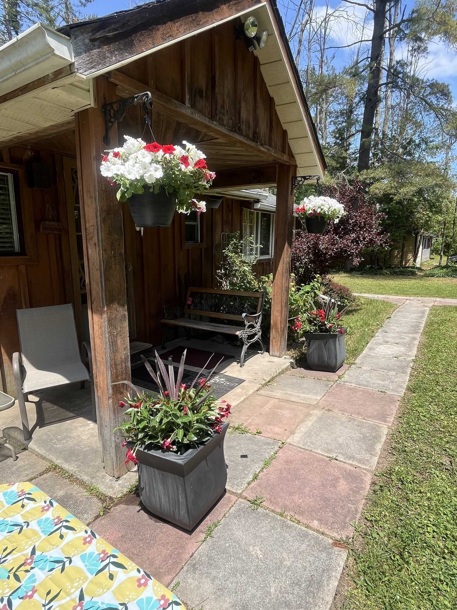Welcome to this beautiful one bedroom, one bathroom quaint cottage. Beautiful private space on dead end road.  Lake Simcoe deeded waterfront access. Additional opportunity to expand with two adjacent lots separately priced. 3