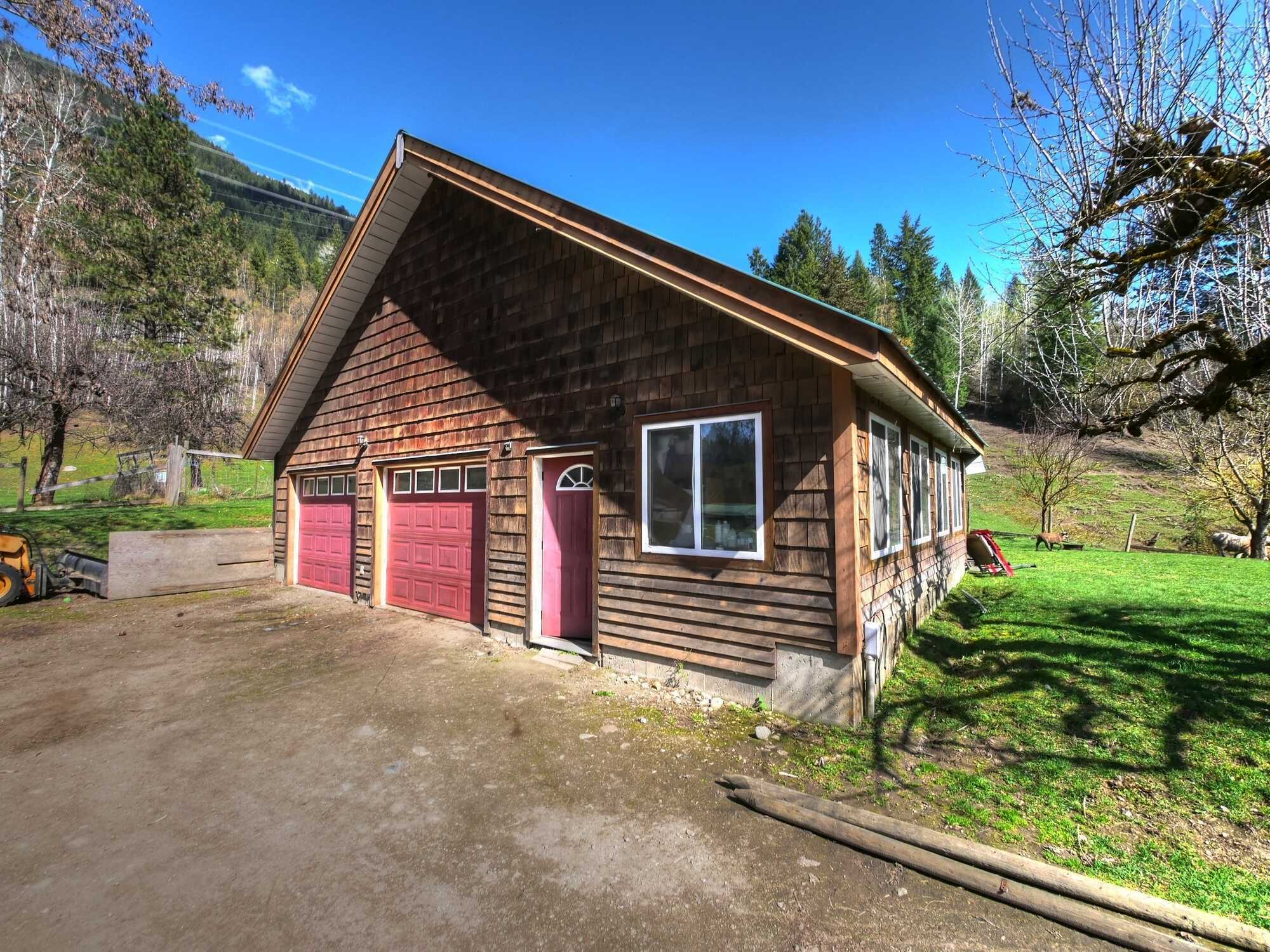 South end of Beautiful Slocan Valley in Slocan Park! Amazing Country Home 4 Bed/3 Bath on 16.33 Fabulous acres!  Garage Shop Barn & More! Ready for farming! 3