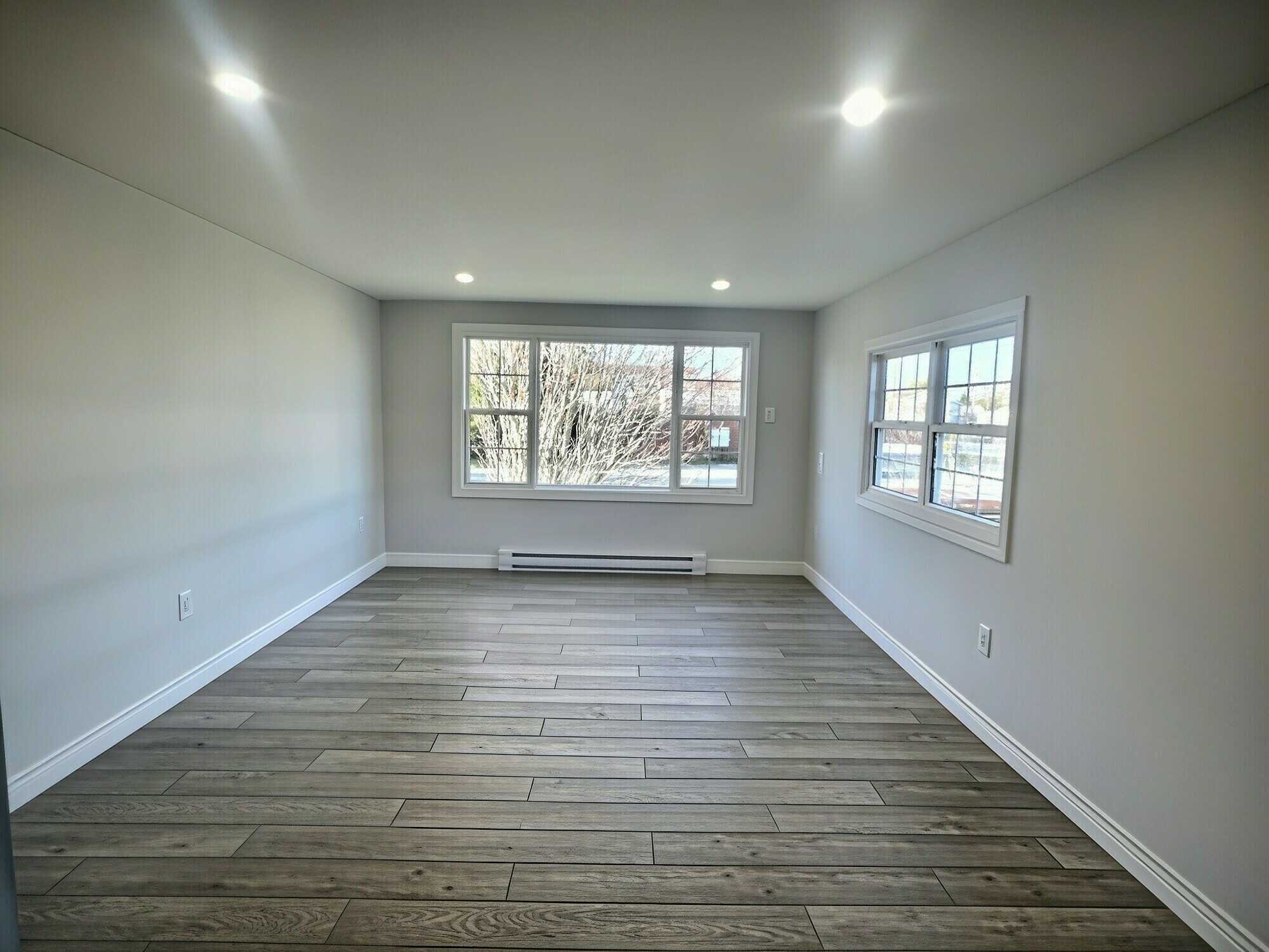 Fully Renovated Two-Bedroom Home with New Roof, Siding & Decks — $240,000 2