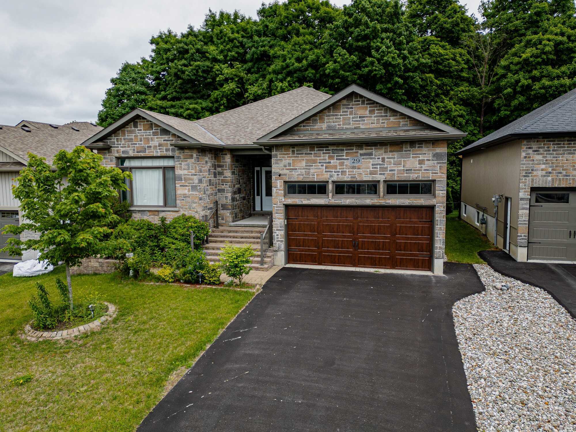 Executive Orchard Lane bungalow on a premium wooded lot! Offering 3+1 bedrooms, 3 baths, nearly 3,000 sq. ft. of finished living space, a custom kitchen, covered deck, finished basement, fenced backyard and an exceptional West Trenton location. 3