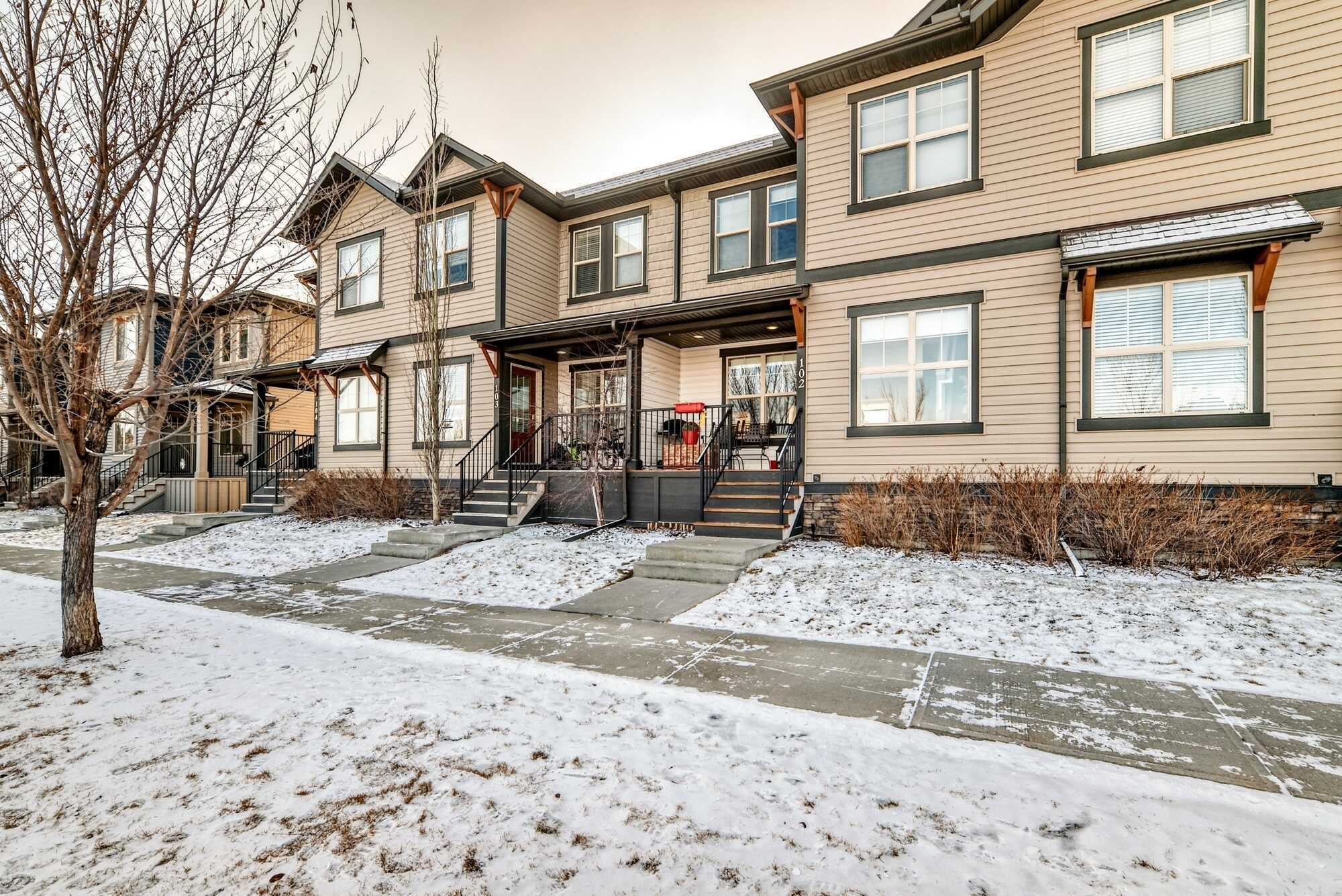 Impeccably maintained park front townhouse with double garage. 3