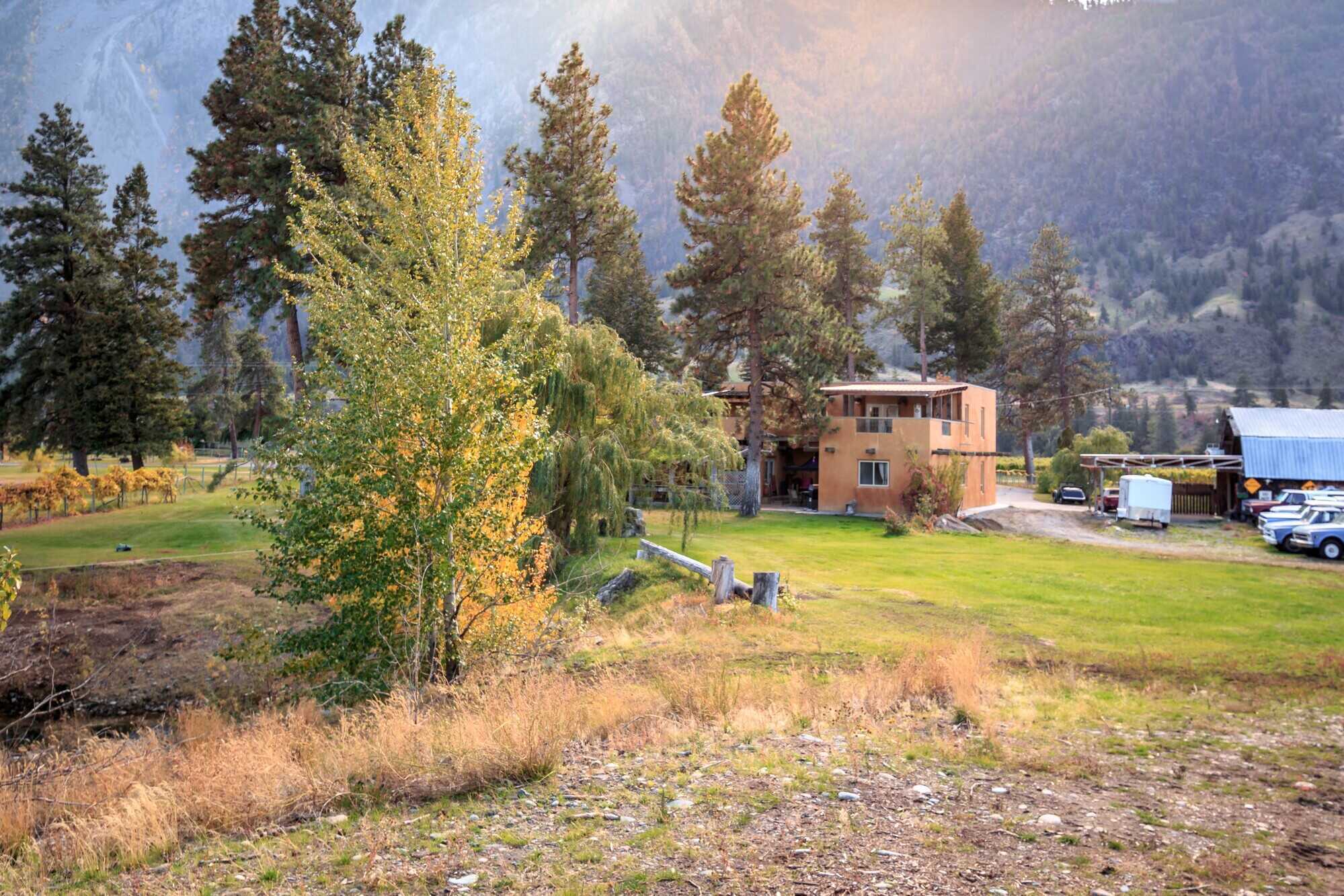 Unique Riverfront property with custom built Adobe home on 9.53 acres! 4