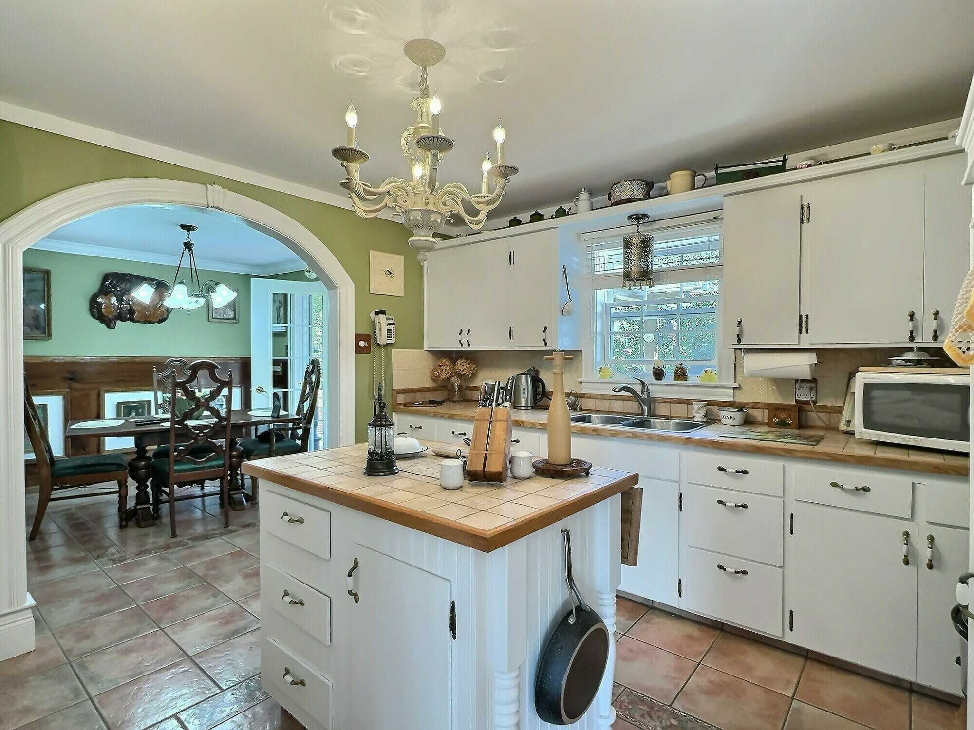 An entertainers dream! Welcome to this beautifully maintained 2,500 square foot home, offering a perfect blend of style and functionality. 2
