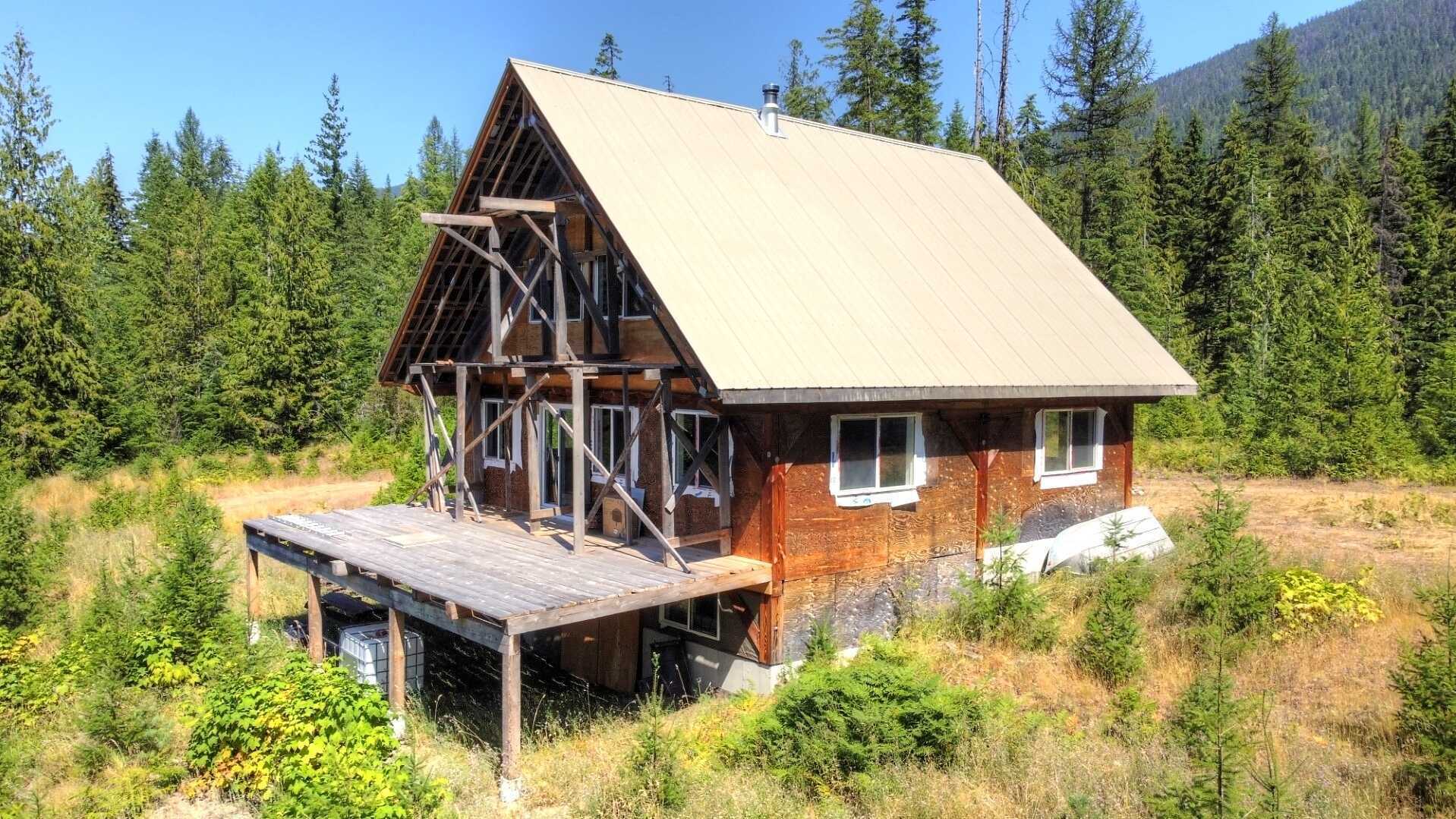 READY & WAITING to be finished 2-3 Bed Country Cottage with views of the Slocan River on 8 ACRES of pure heaven!  Beneath the Slocan Valley skies, this home is paradise! 5
