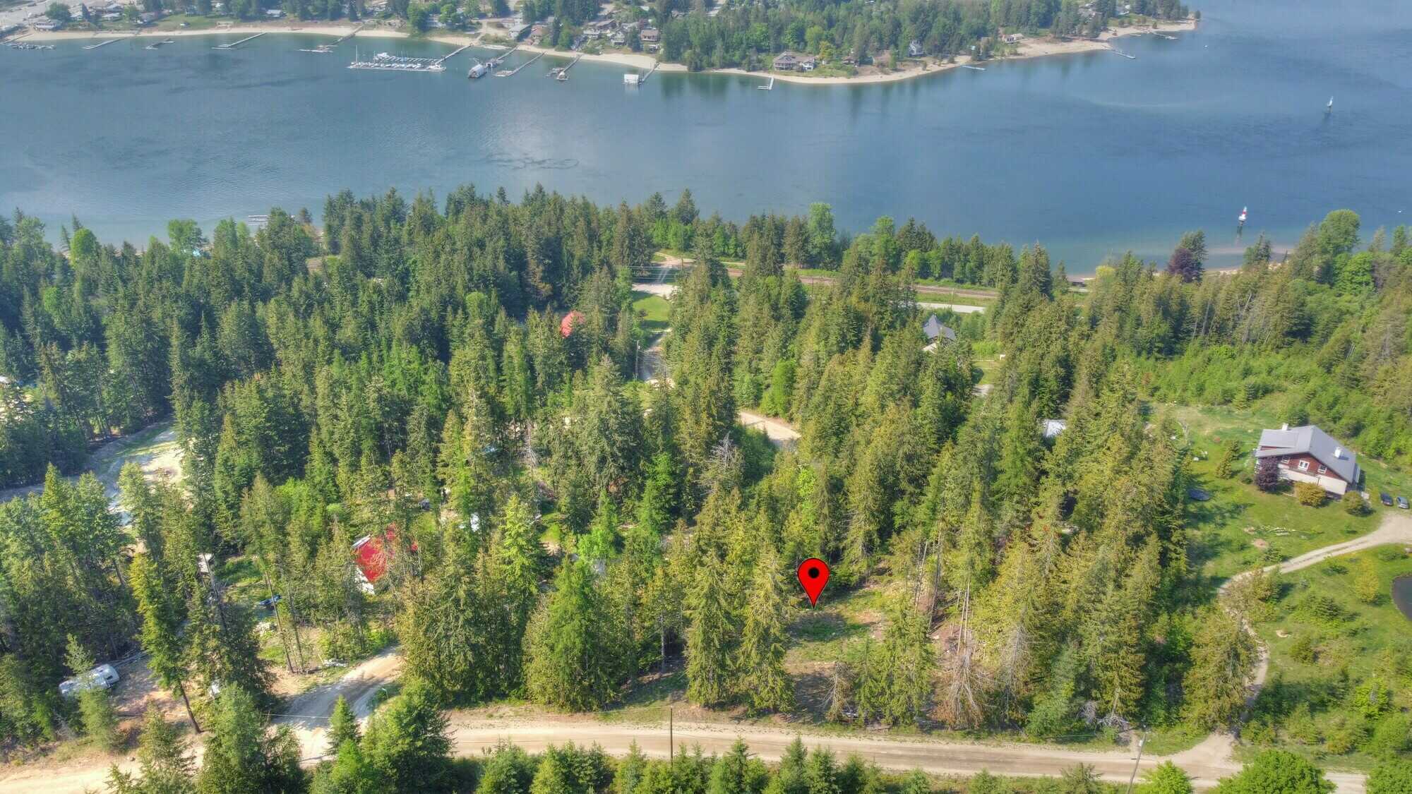 PROCTER!!  AMAZING VACANT LOT waiting for its new family!!  0.51 ACRES with EXCELLENT drilled well on site!  Awesome valley & mountain views with potential of a lake view! 2