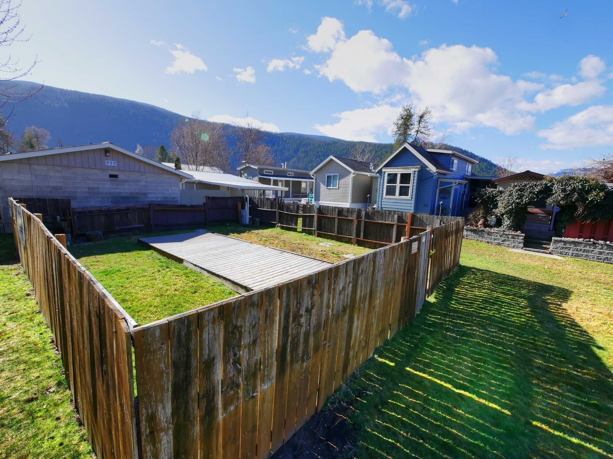 Next to Kootenay Lake!  VACATION PROPERTY - LARGE LOT! NEW MARINA BY 2026 Private and ideal for the summer getaways! Hookups for RV or TINY HOME or put in a MODULAR HOME! 2