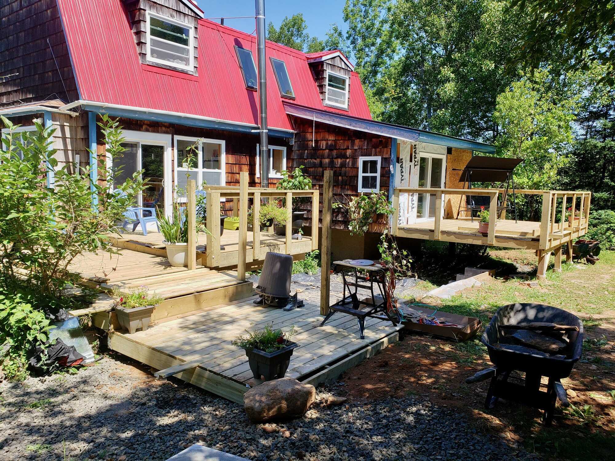 Great country living with views, plus 5 units of rental or AirBnB income, with over 30 acres of land. Located in Upper Clements just 3KM outside of Annapolis Royal. 5