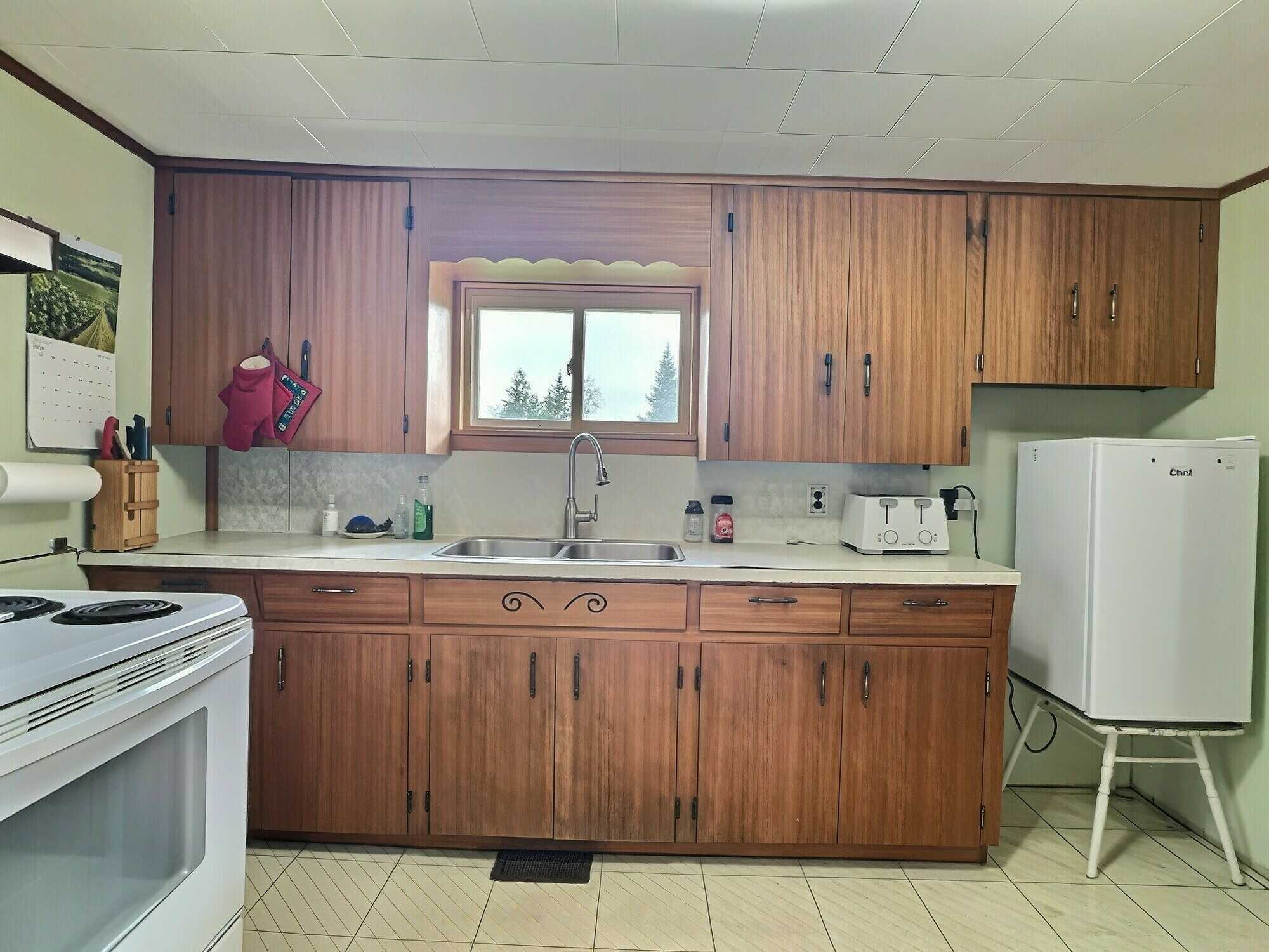 Bring your vision and restore the charm of this century home set on 11 beautiful acres of peaceful countryside! 3
