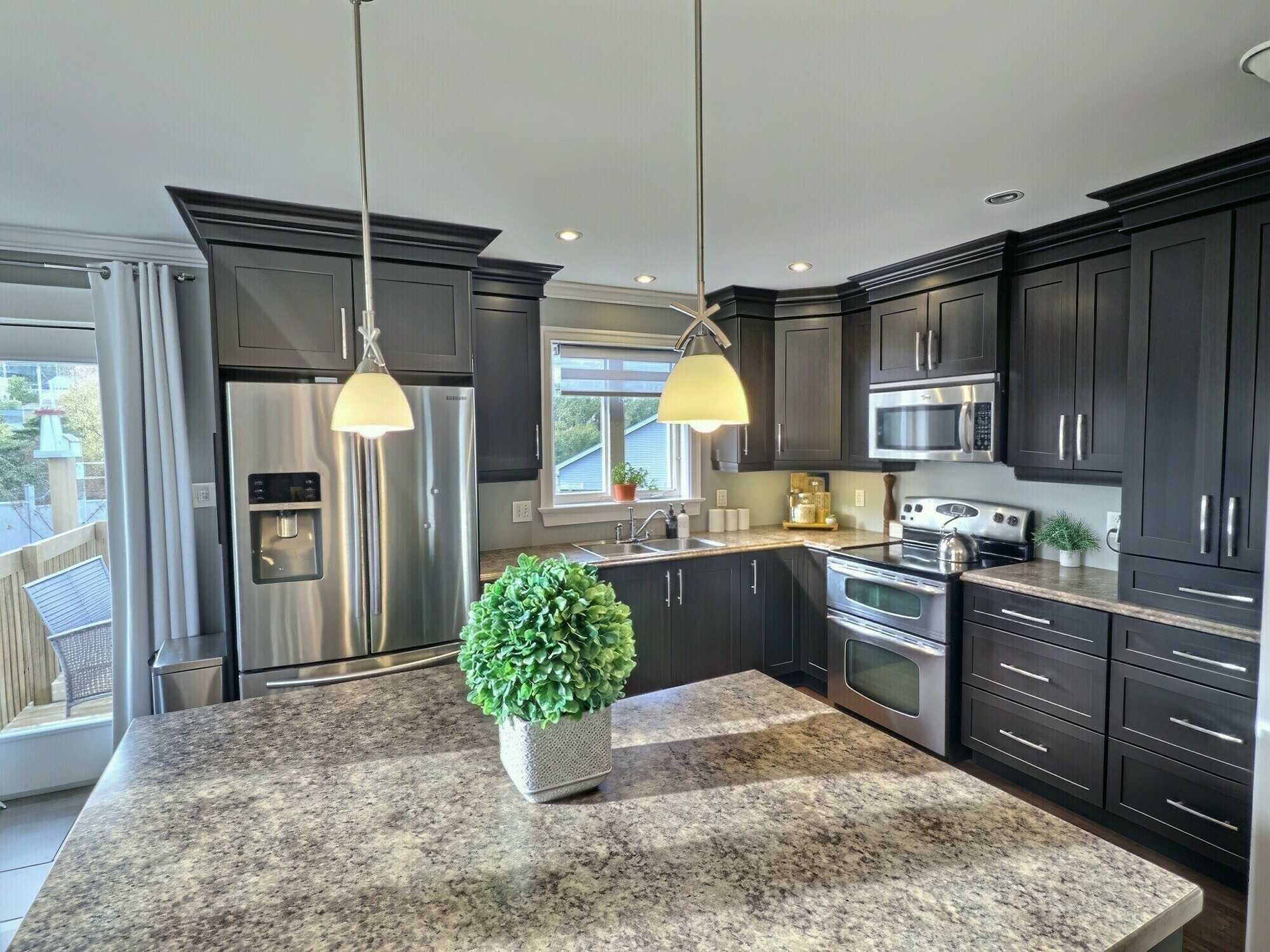 Spacious 4-Bedroom Home with Private Backyard & Direct River Access in Torbay 5