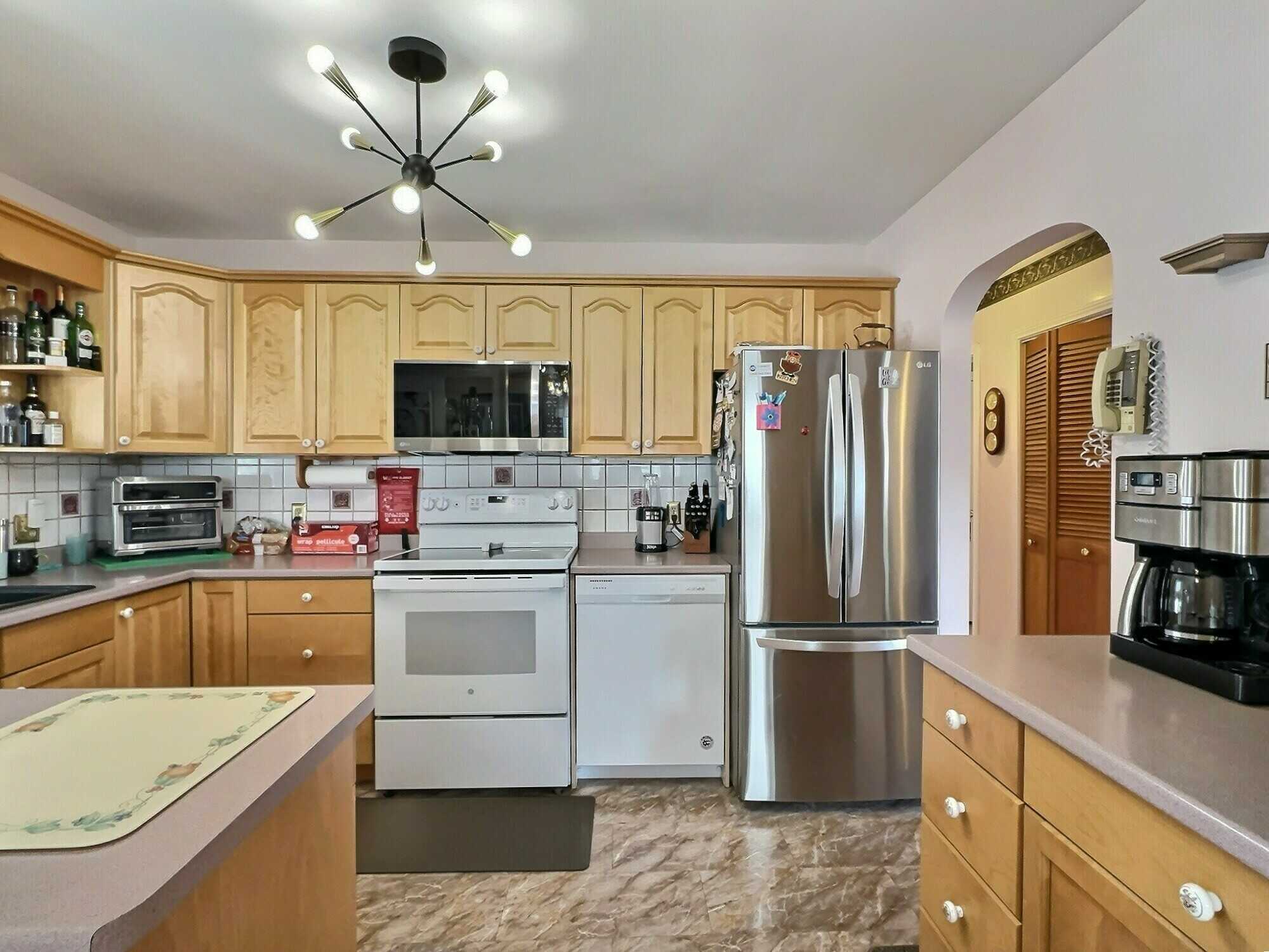 Welcome to this well-maintained 3-bedroom split entry home, ideally located in a highly sought-after Valley neighborhood! 3