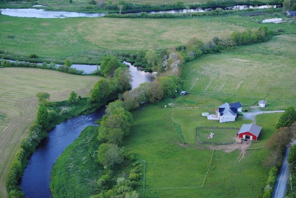 Custom-built 5-bedroom riverfront home on 34 acres with barn, pool, mixed-use zoning, and breathtaking views of the Musquodoboit River. Less than an hour from Halifax, yet a world away from the hustle and bustle. 2