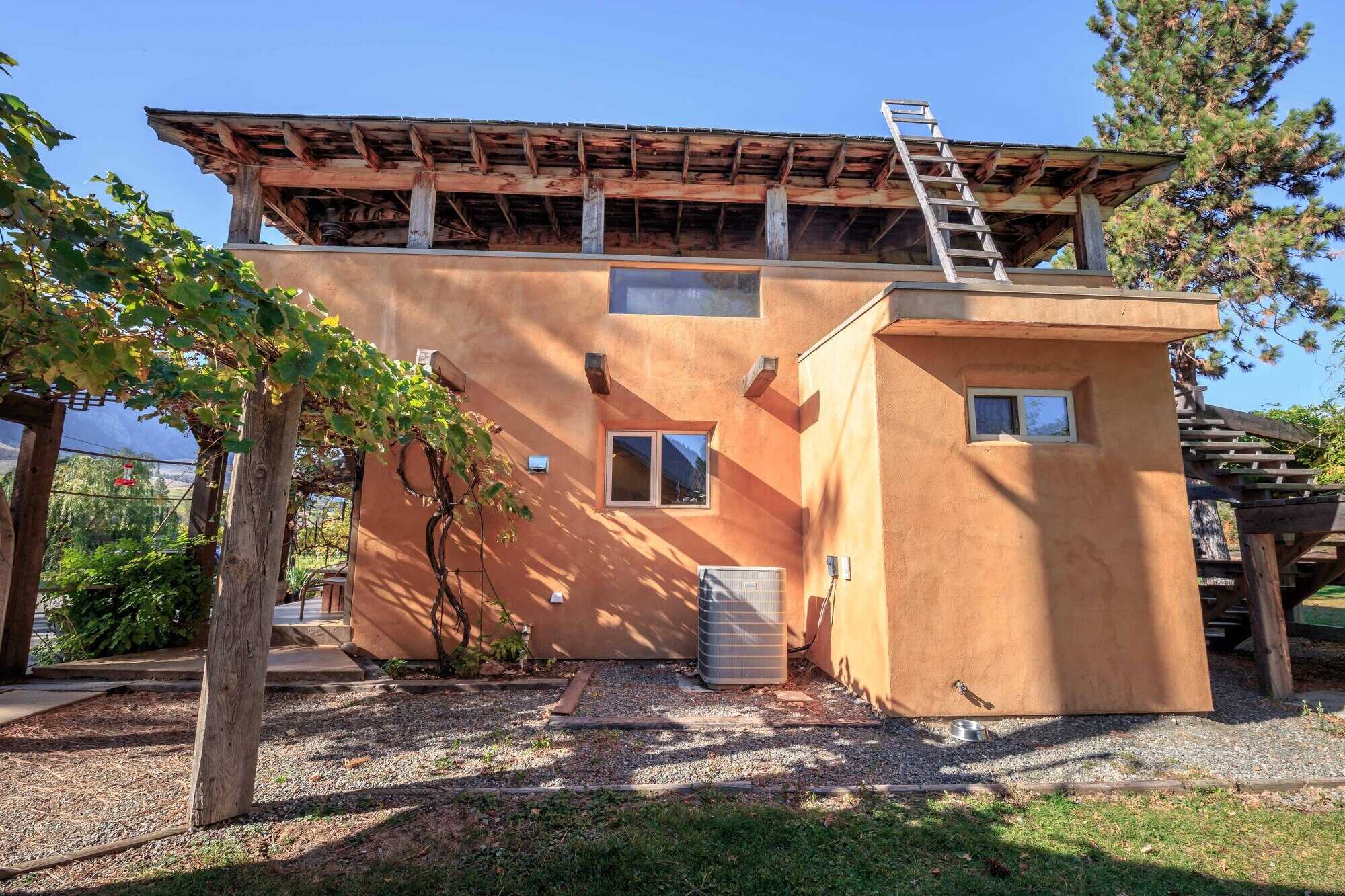 Unique Riverfront property with custom built Adobe home on 9.53 acres! 5