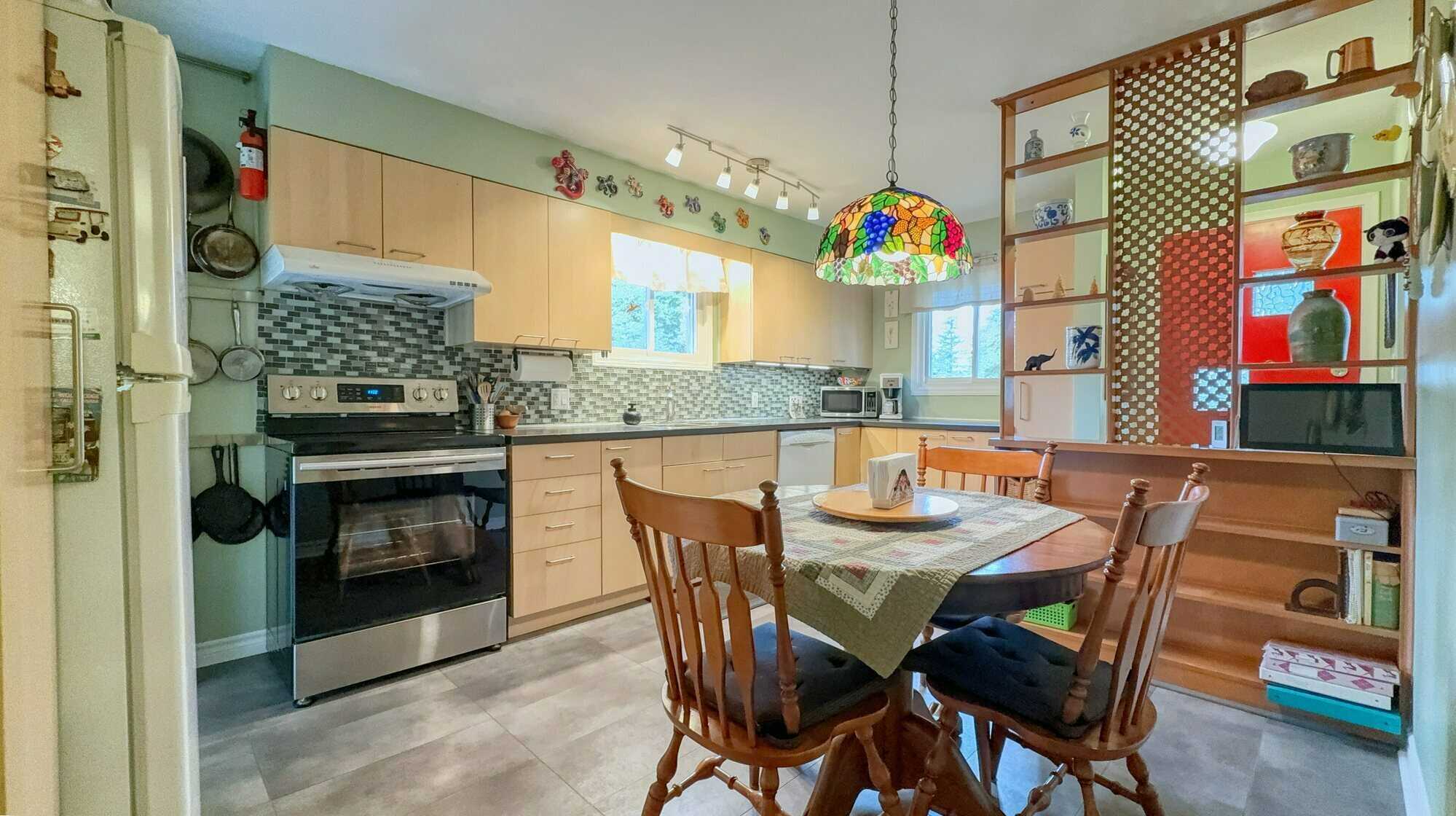 Centrally Located Bungalow with attached garage! 3