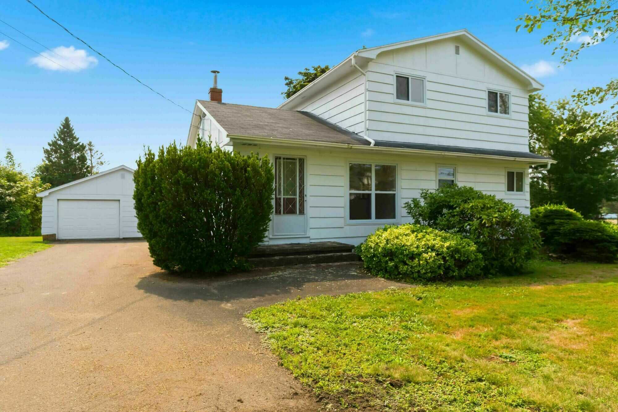 Country Living with Almost 4 Acres, Garage & Large Barn! 4