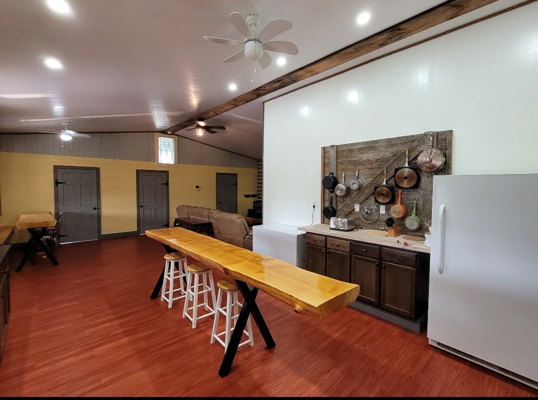 This cute, spacious, 3000 square foot, 2 storey house is sitting on just under an acre & surrounded by forest. 3
