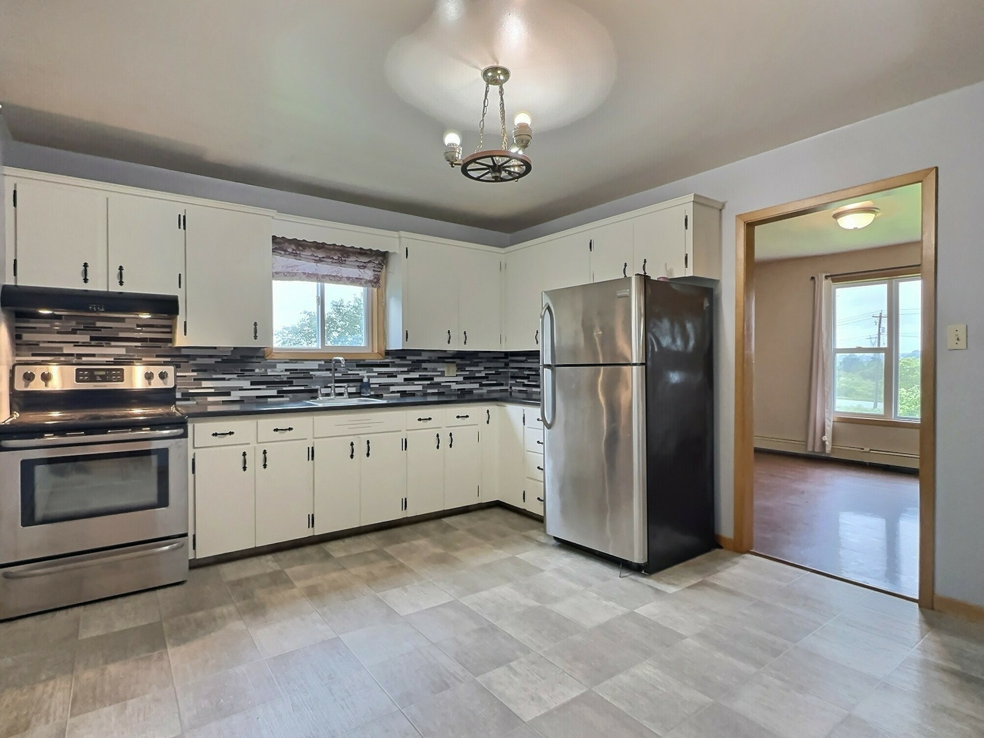 Well-maintained 3-bedroom bungalow in desirable Lower Truro, offering comfortable living on a generous lot of over half an acre and just minutes from all amenities! 2