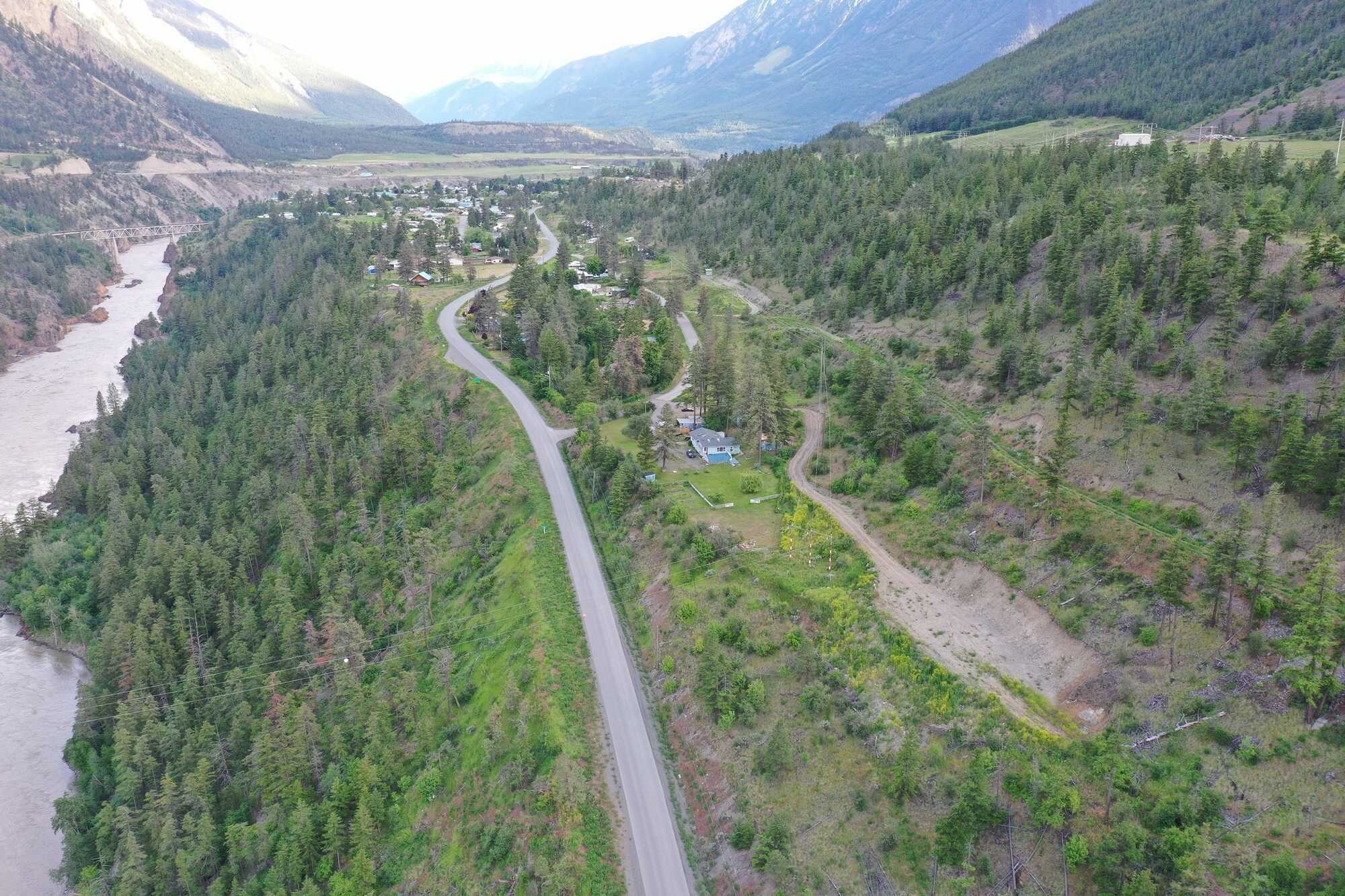Developers alert !  Located in scenic Lillooet, along the upper Fraser River, this large 1 acre lot overlooking pure paradise awaits. Ready to build your dream home !! 4