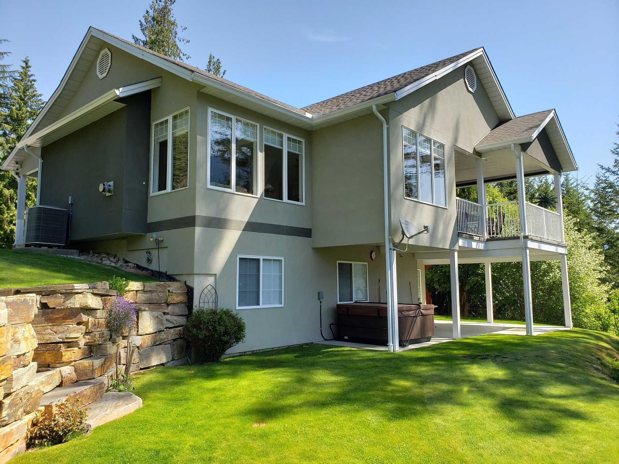 NEW PRICE! KOOTENAY LAKE VIEW. GORGEOUS!! PANORAMIC KOOTENAY LAKE VIEW FAMILY HOME 4BED+ 3BATH! with 2 Bed Suite Potential & a 1 Bed Studio Potential for extra income or Extended Family Living, 1/2 acre of GORGEOUS landscaped property! MUST SEE 5