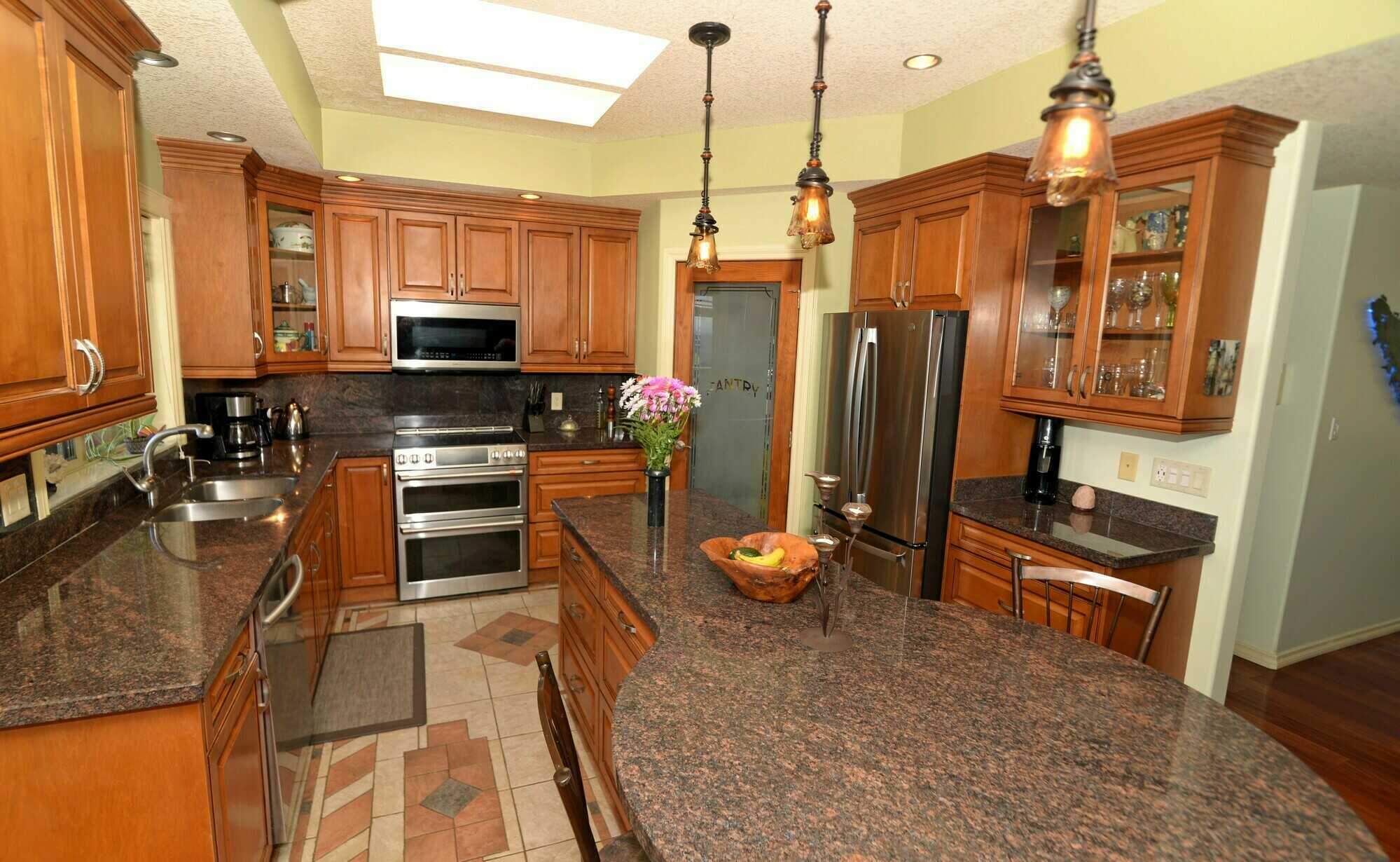Price Reduced. Ocean and Mountain view 3900 sq. ft. 6 bedroom + Office/Den 4 bathroom family home with Legal suite. 5
