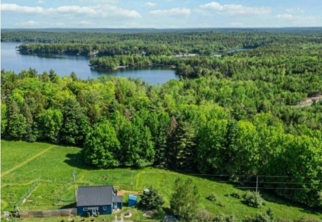 This amazing farmhouse on 2.1 peaceful acres has been completely modernized . 2