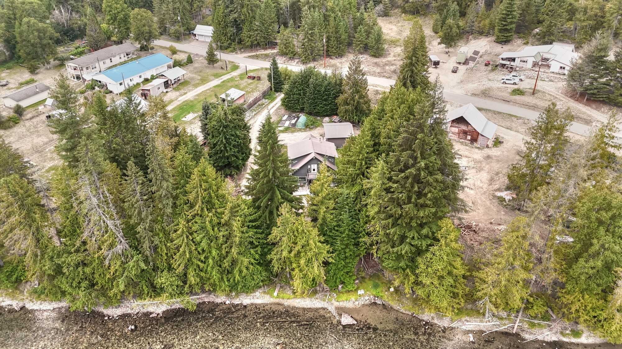 REALTORS WELCOME!! Offering $15,000 Commission
SLOCAN RIVER WATERFRONT PROPERTY!  LOVELY 3Bed 2Bath Family Home! Move In Ready! Landscaped! Detached HUGE Carport! New Well & Underground electrical 4