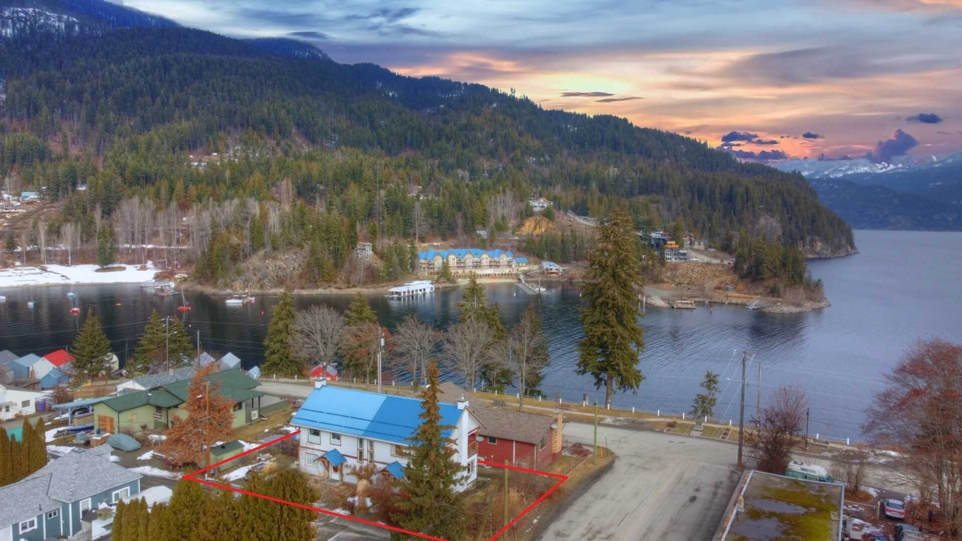Large 4 Bed Family Home or a Duplex! High Potential Income Property! Kootenay Lake views & Fantastic Location in Kaslo! 2