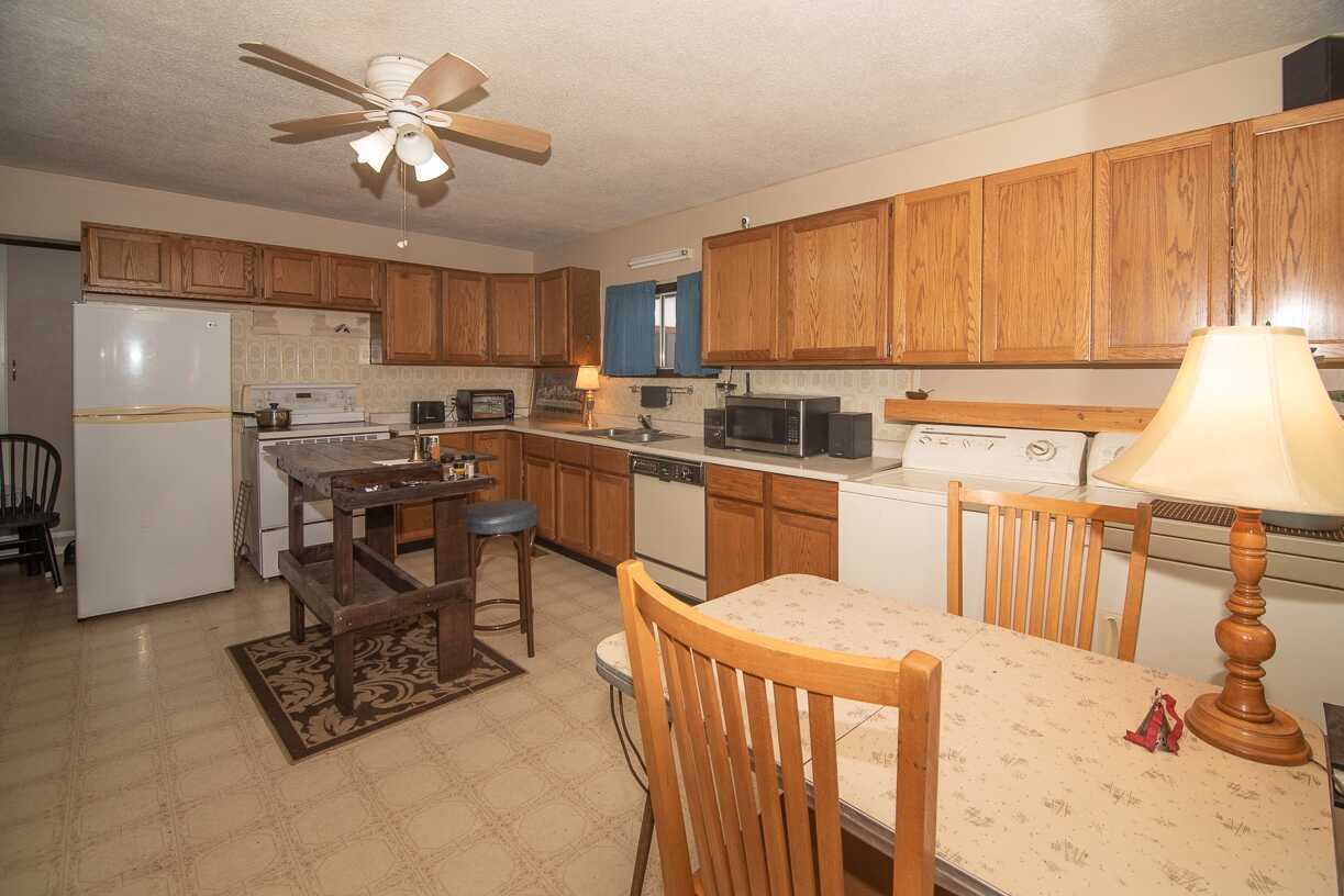 Awsome 2 bedroom RANCHER home on a large corner lot! Very nicely maintained on a fully fenced property with screened in porch, and a powered 10x10 shop/shed 5