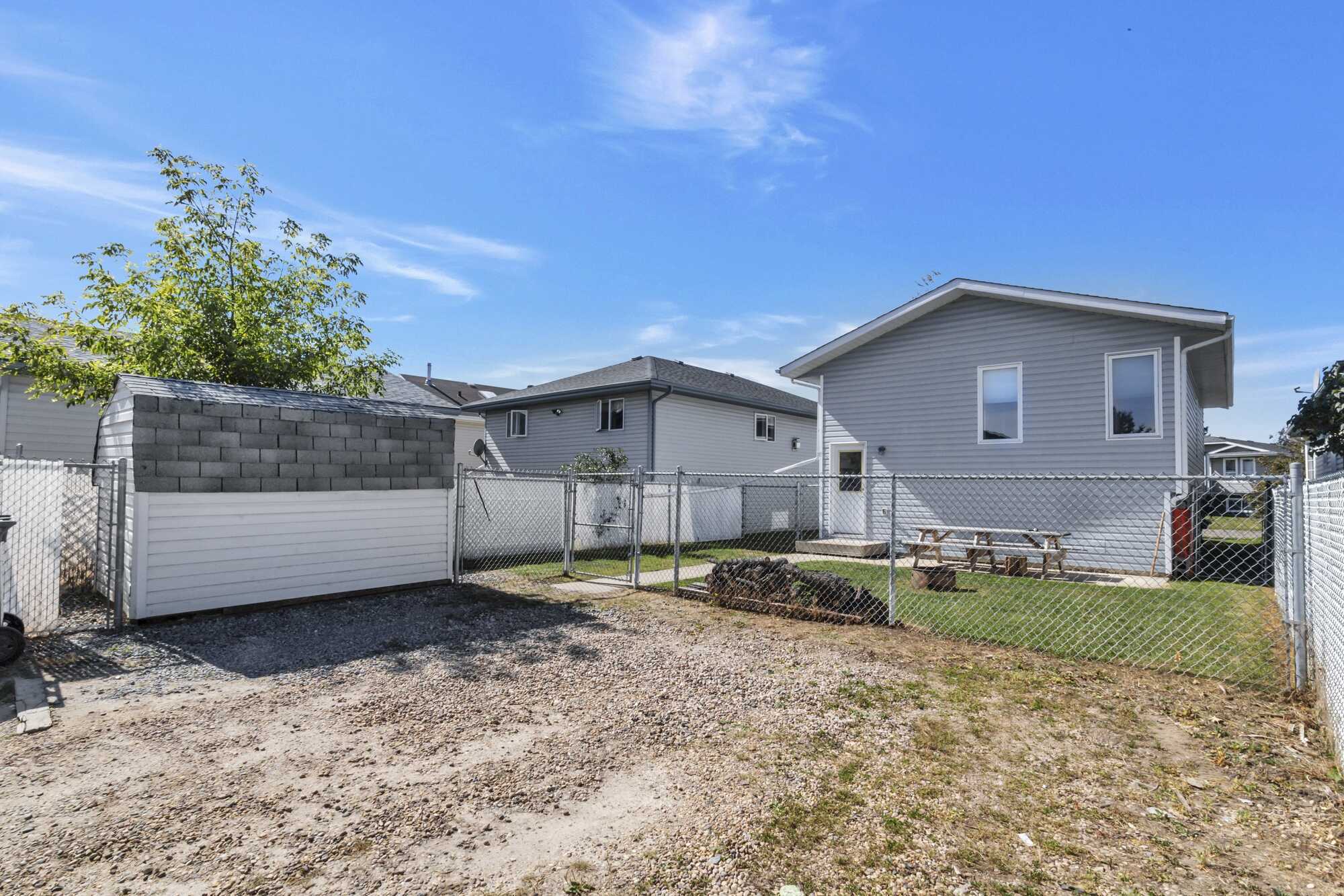 Immediate Possession ~ Bi-Level ~ 4 Bed, 2 Bath ~ Great Starter Home ~ Sylvan Lake 3