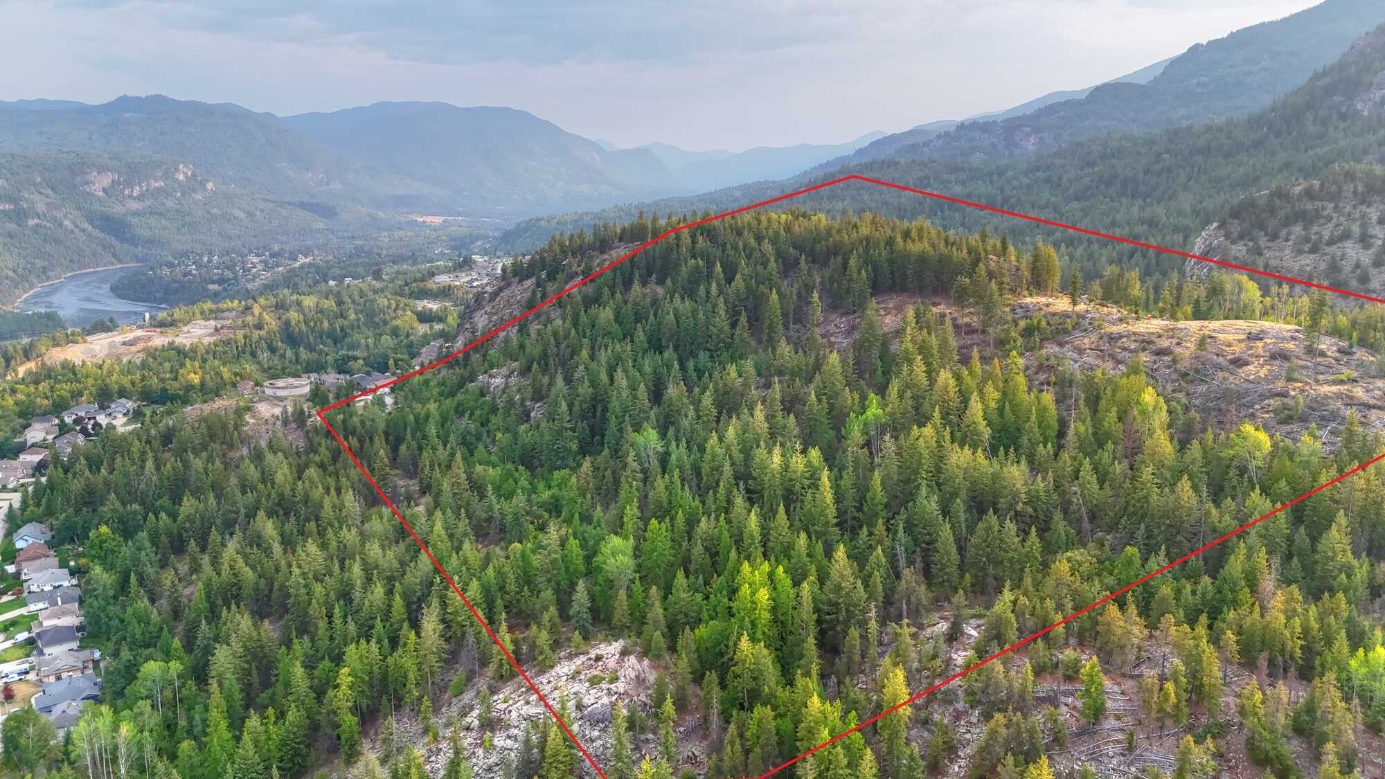 PANORAMIC VIEWS FROM THE MOUNTAIN!!  Own your own mountain!  40 Acres in the heart of Castlegar!  Development potential for Residential, Campground or Tiny Home Community 2