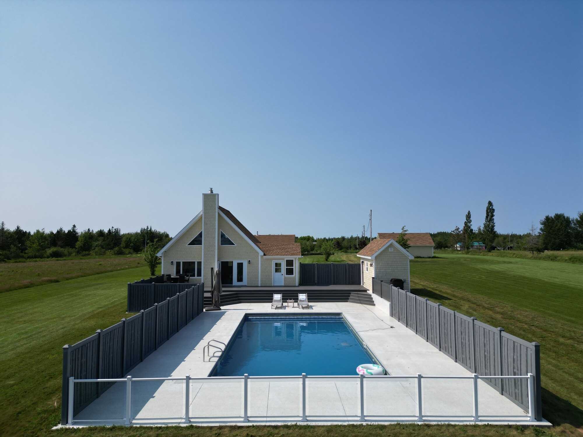 Experience coastal living at its finest with this exceptional executive waterfront estate set on approximately 4 private acres, complete with a secluded beach and breathtaking ocean views! 2