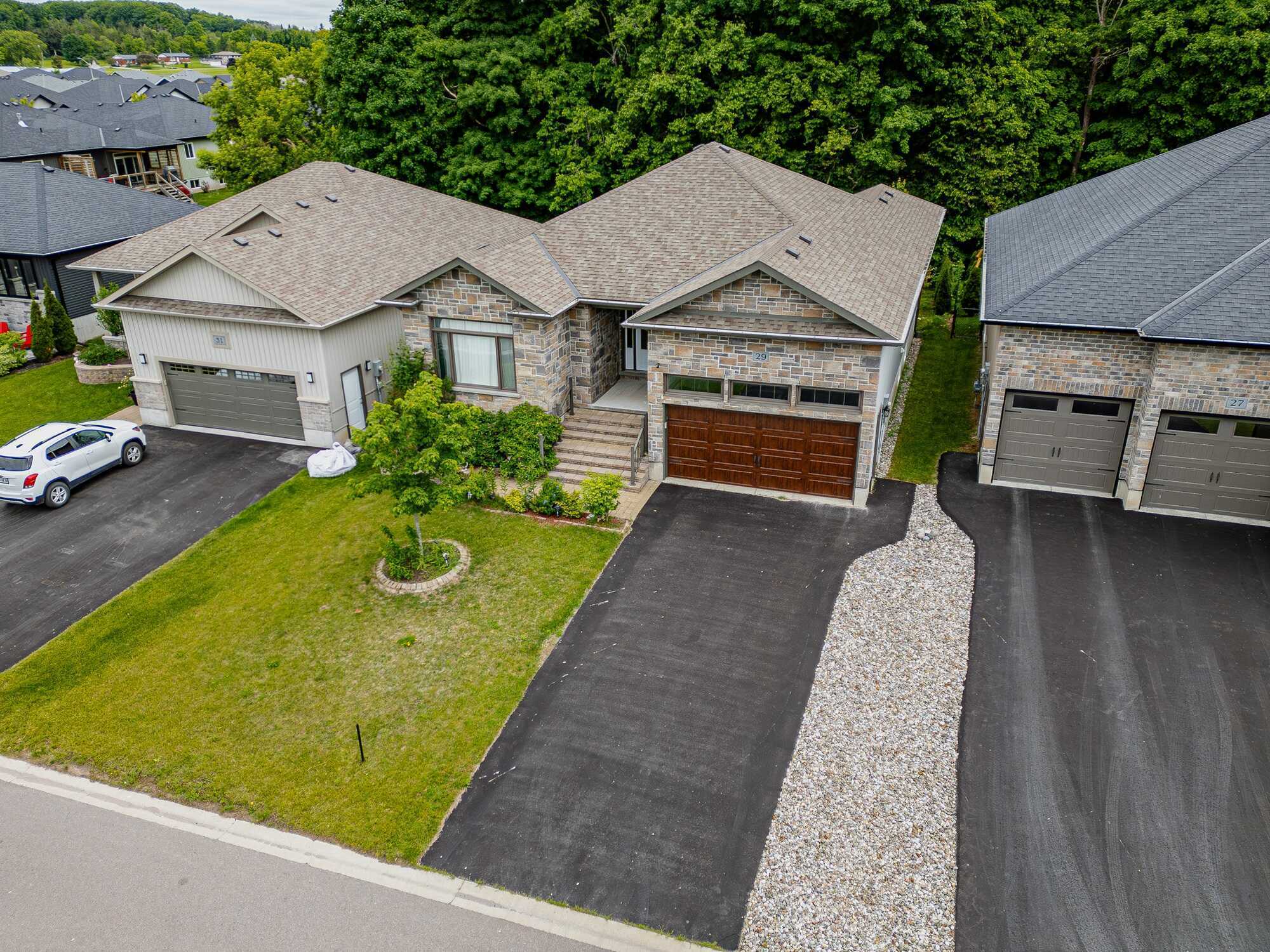Executive Orchard Lane bungalow on a premium wooded lot! Offering 3+1 bedrooms, 3 baths, nearly 3,000 sq. ft. of finished living space, a custom kitchen, covered deck, finished basement, fenced backyard and an exceptional West Trenton location. 2