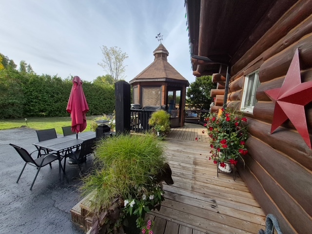 Rustic Charm Meets Modern Comfort. Your dream log home awaits, with every amenity to call your own retreat. This charming log home blends rustic character with modern comfort, set against a peaceful countryside. 3
