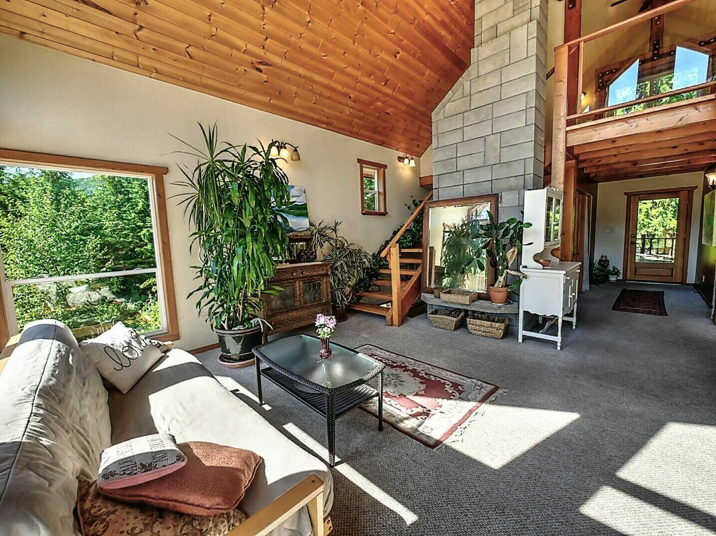 APPROX 28 ACRES! Stunning location! GORGEOUS 4Bed 2Bath Home! 2 min drive to Slocan Lake! Studio building! Potential Farm! 5