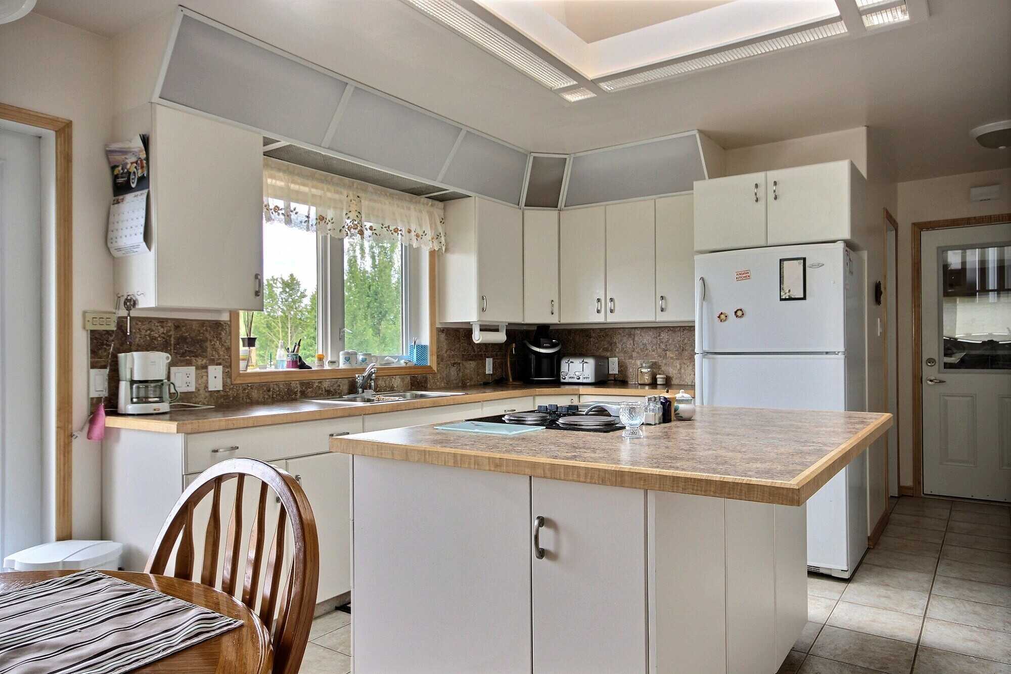 Welcome to Laurier Lake – Year-Round Living with Stunning Lake Views! 5