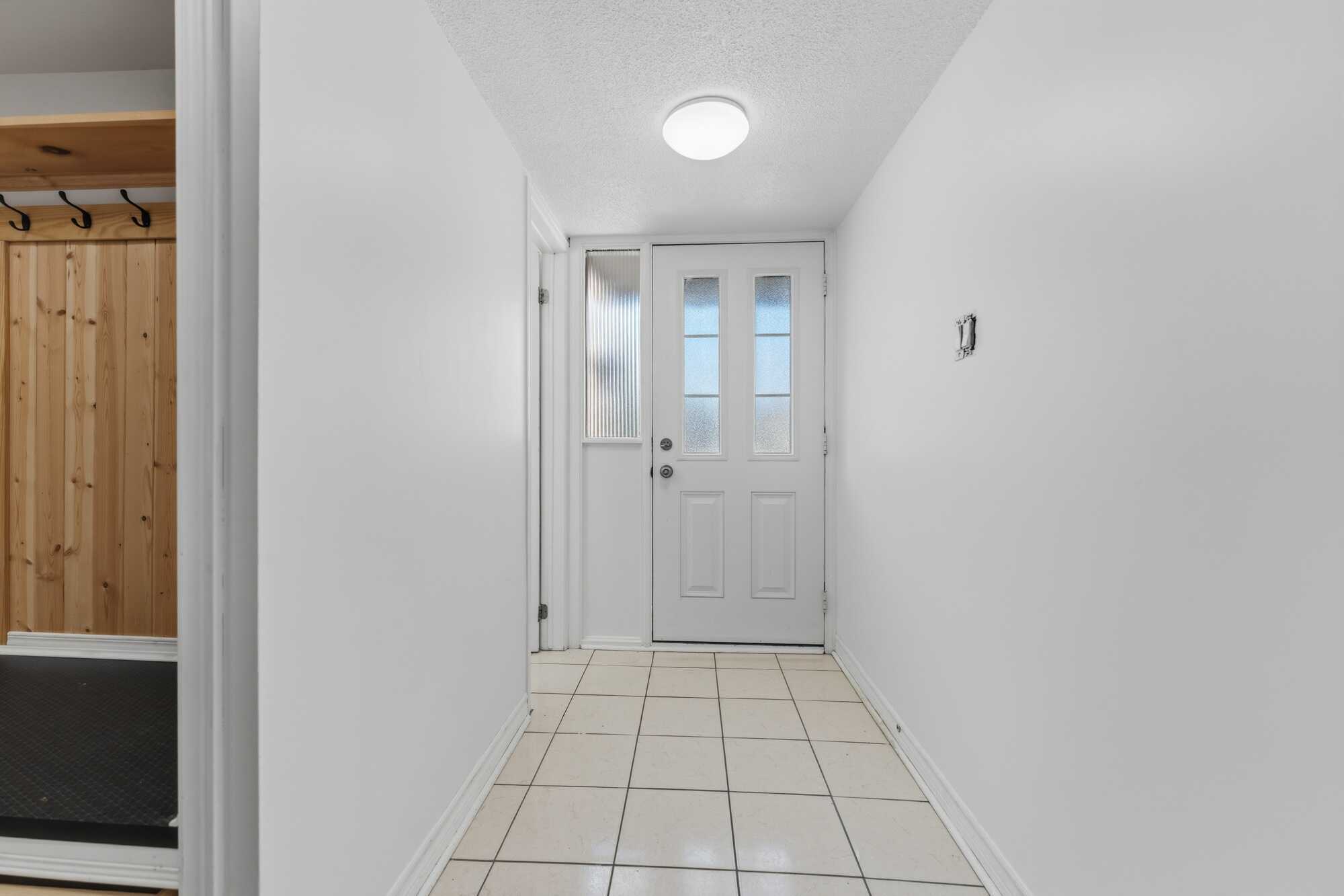 Spacious 4-Bedroom Condo with Private Treed Backyard and Unbeatable Location 3
