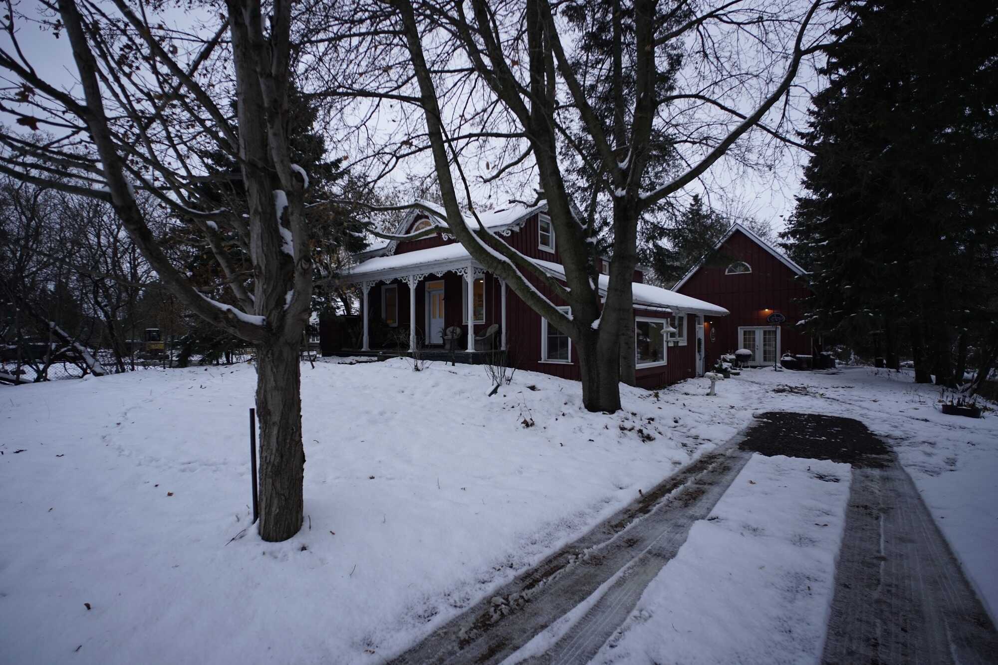 Rare commercial-residential zoning on beautiful lot in prime location. Homesteaders paradise. Gorgeous century home with modern  additions & upgrades. 2
