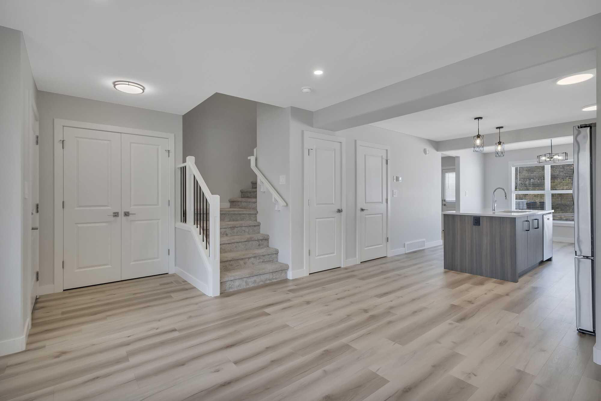 Newer (2025) ~ Bright 2 Story ~ 1/2 Duplex ~ Backs Onto Field ~ Great Location ~ Sylvan Lake 5