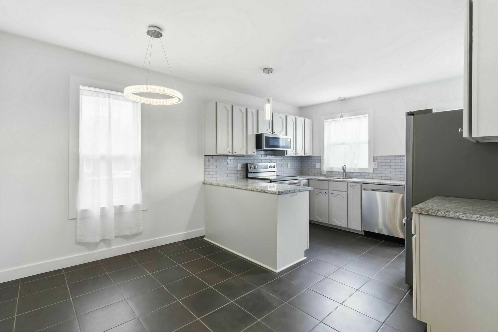 Versatile Cole Harbour property with endless possibilities! Enjoy a flexible layout with 4 bedrooms, 2 kitchens, 2 baths, separate living spaces, & potential for multi-generational living, a mortgage helper, or conversion back to a single-family home 4